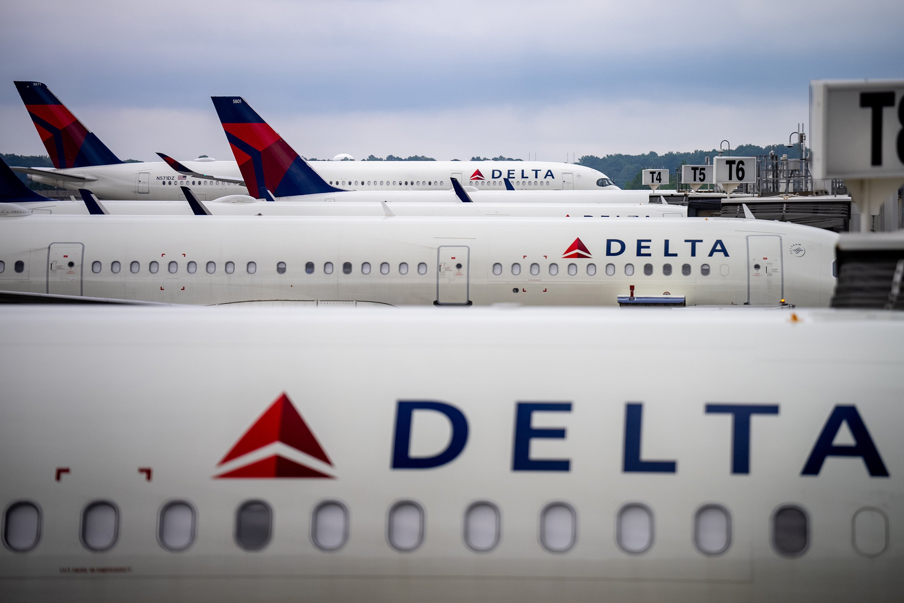 Delta Air Lines planes sit parked at Hartsfield-Jackson Atlanta International Airport on Sunday in Atlanta. Photo: TNS