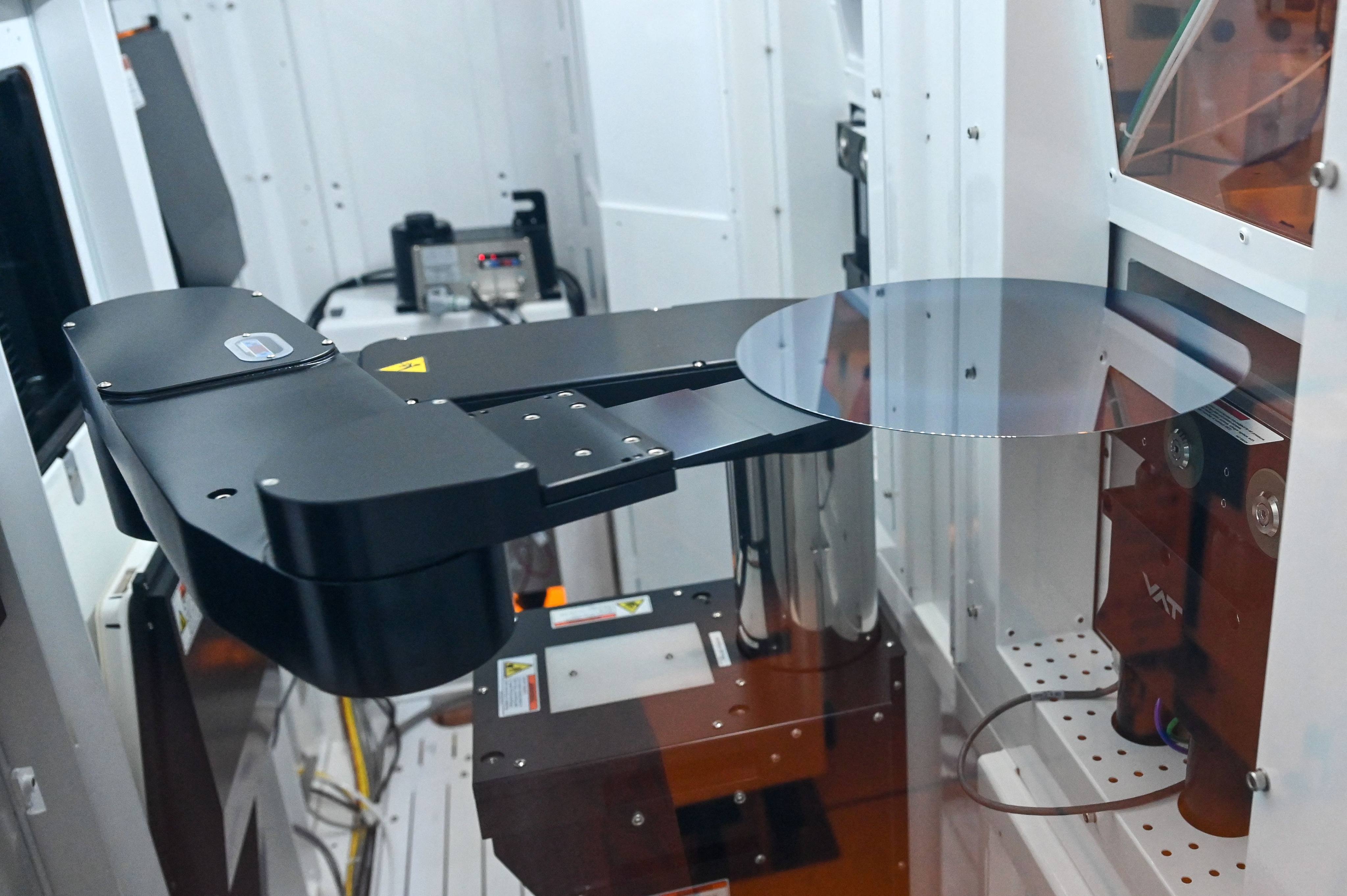 A robotic arm transferring a wafer fab inside its manufacturing facility at Singapore GlobalFoundries in Singapore in September 2023. Photo: AFP