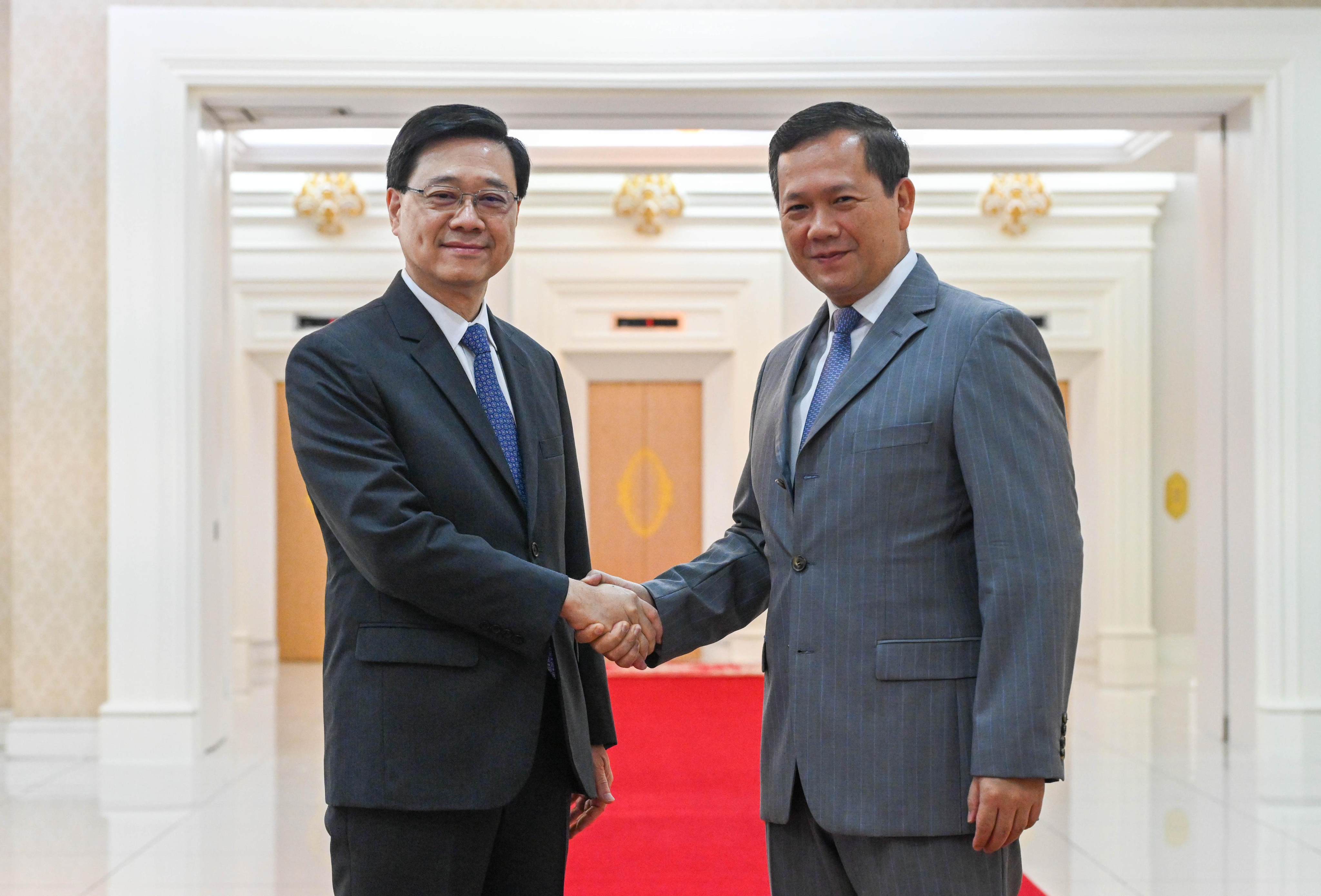 Chief Executive John Lee (left) and Cambodian Prime Minister Hun Manet meet on Wednesday. Photo: Handout