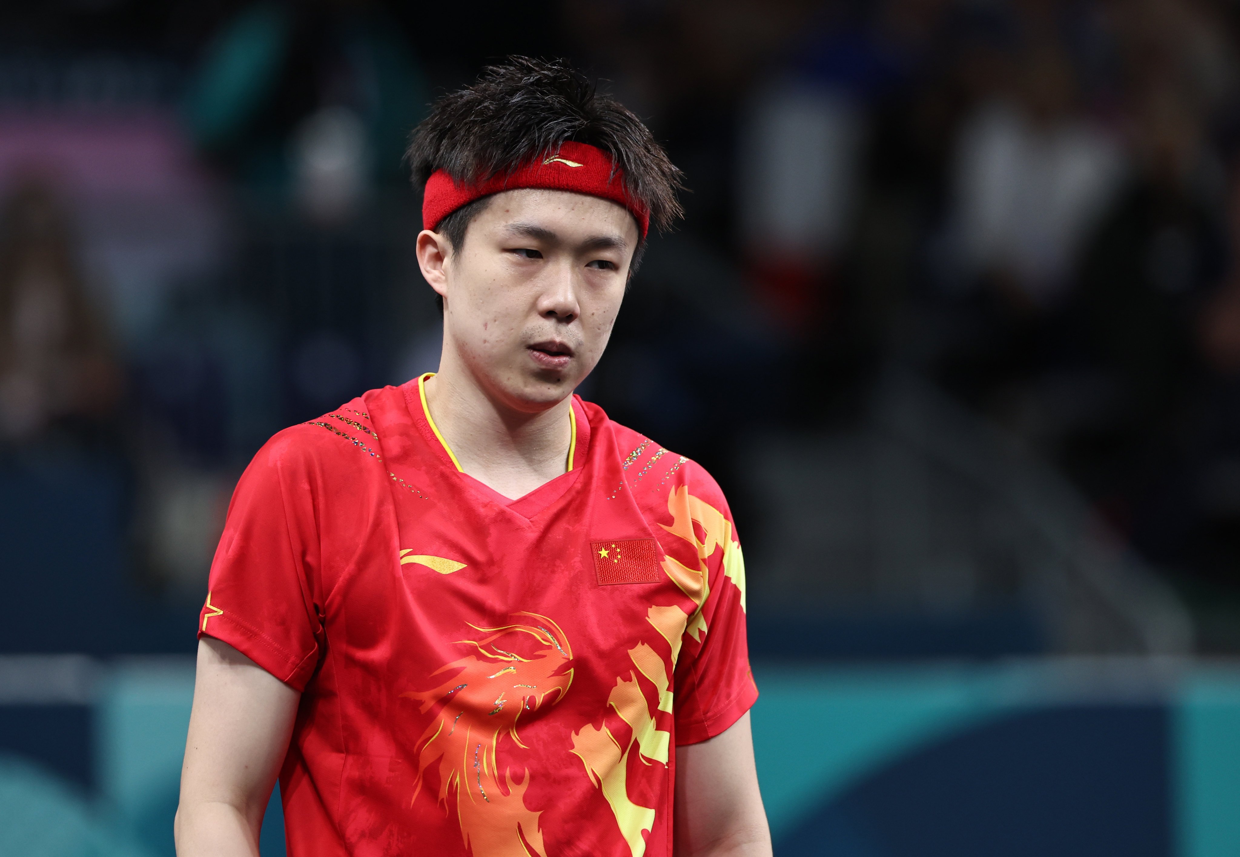 Wang Chuqin has been knocked out in the round of 32 in the men’s singles. Photo: Xinhua