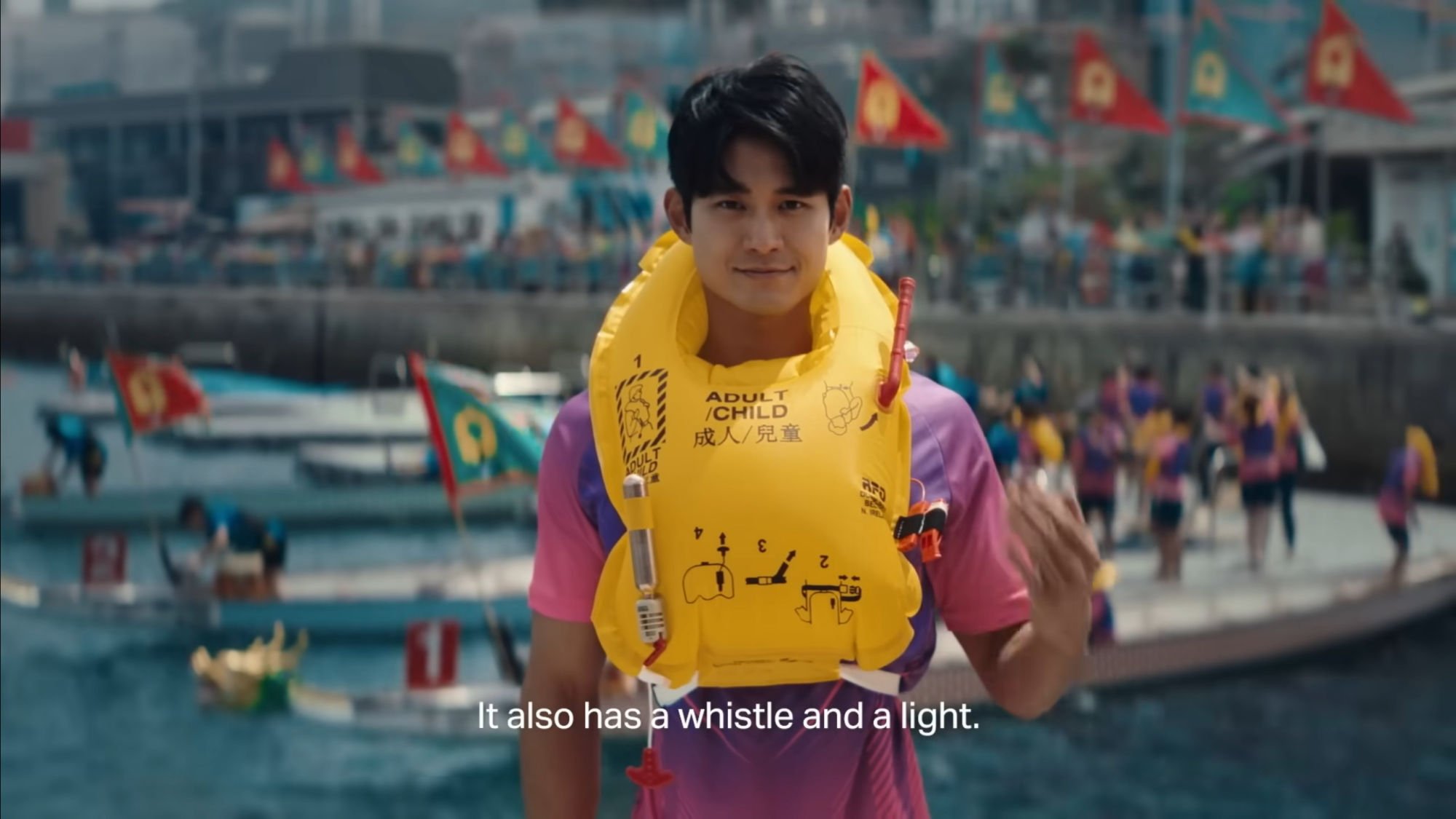 Dragon boat races are the backdrop to the life jacket demonstration in the video. Photo: Cathay Pacific