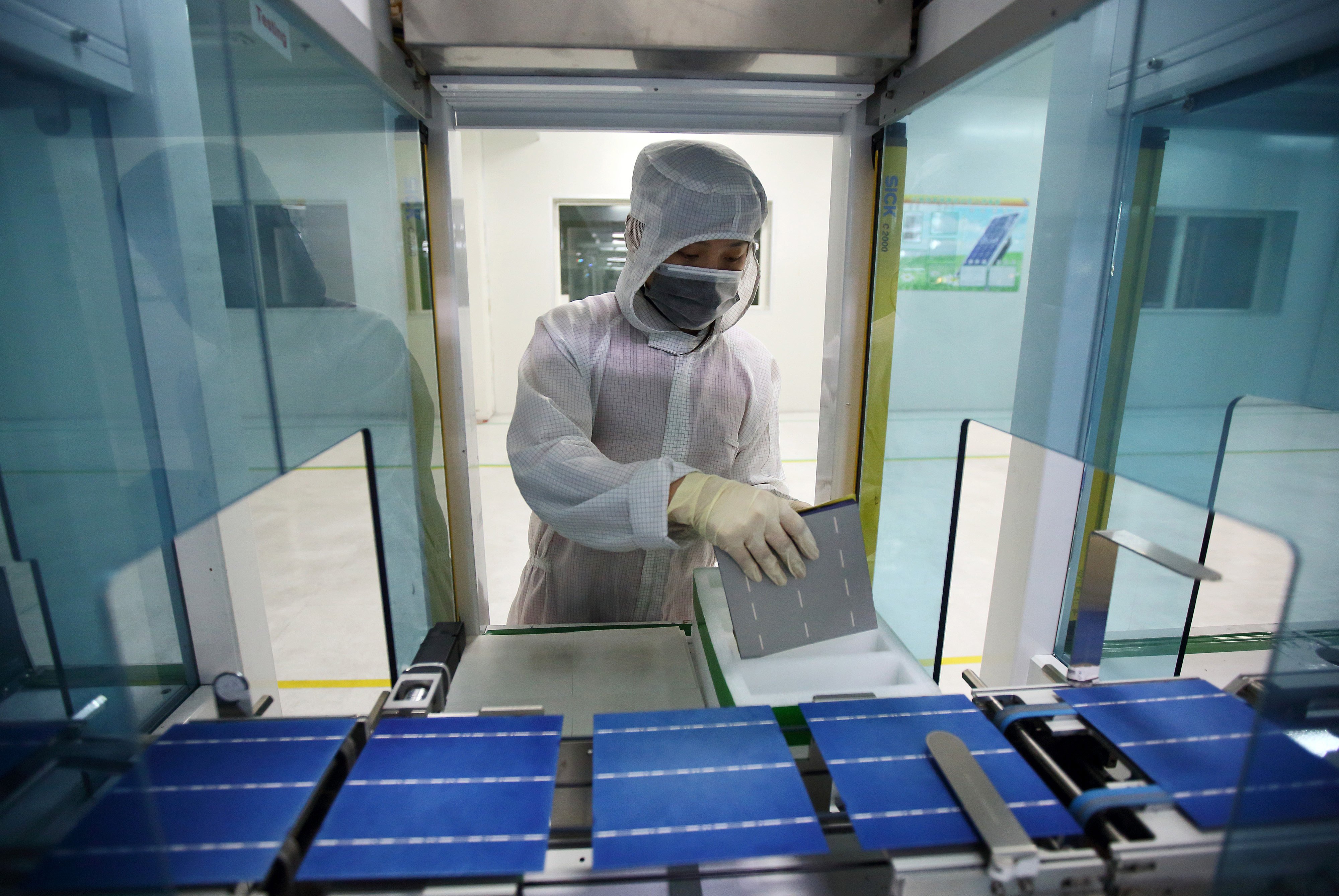 China’s leading solar panel companies, including Xi’an LONGI Silicon Materials and Trina Solar, have already invested in module manufacturing plants in the US. Photo: Bloomberg