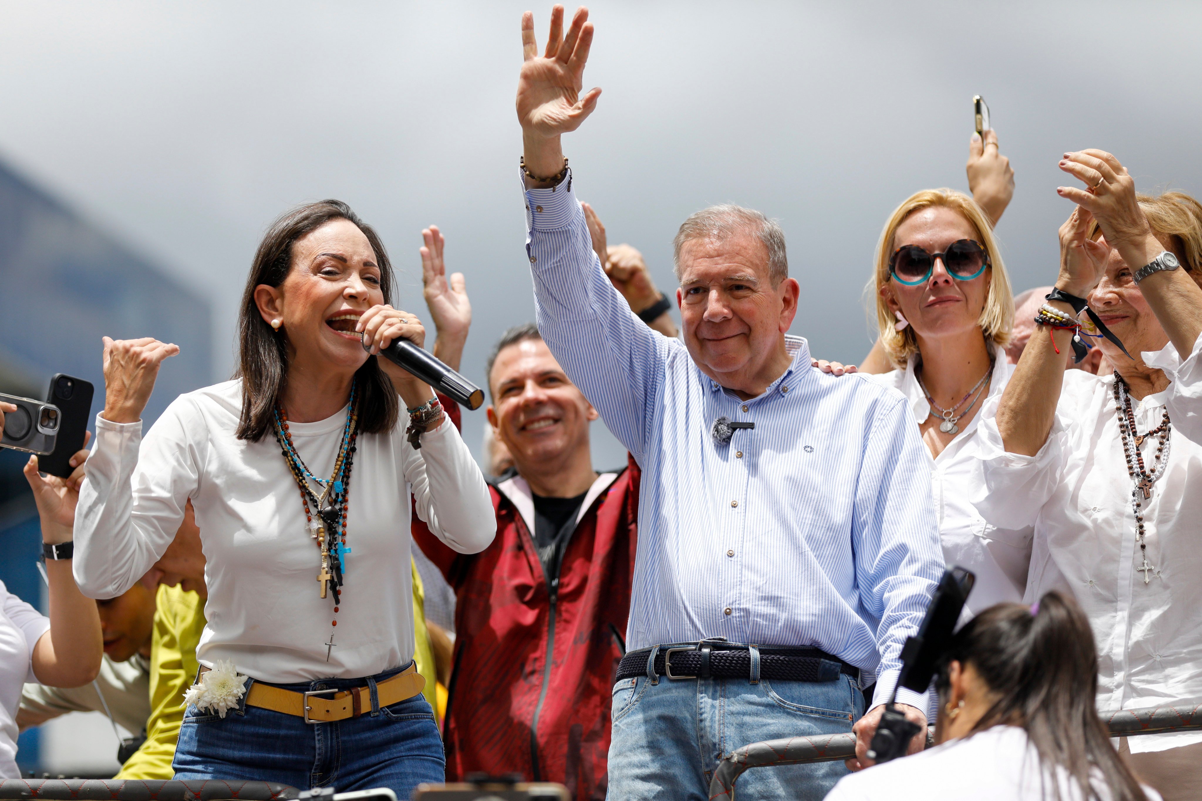 Venezuelan opposition leader Maria Corina Machado, left, and opposition candidate Edmundo Gonzalez address supporters during a protest against the official presidential election results declaring President Nicolas Maduro the winner in Caracas, Venezuela on Tuesday. Photo: AP