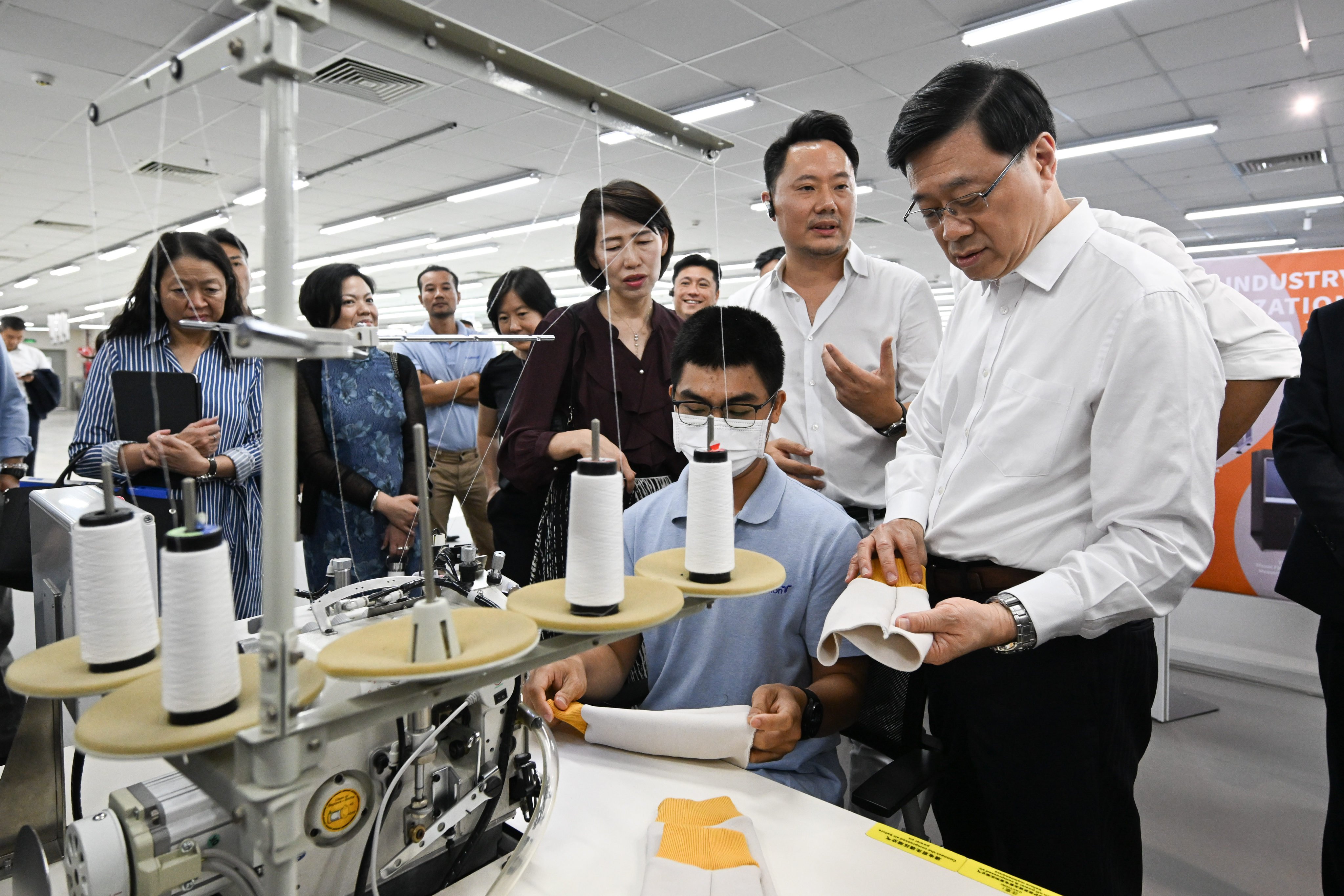 John Lee checks out the goods at a Hong Kong firm’s shirt factory in Vietnam. Photo: ISD