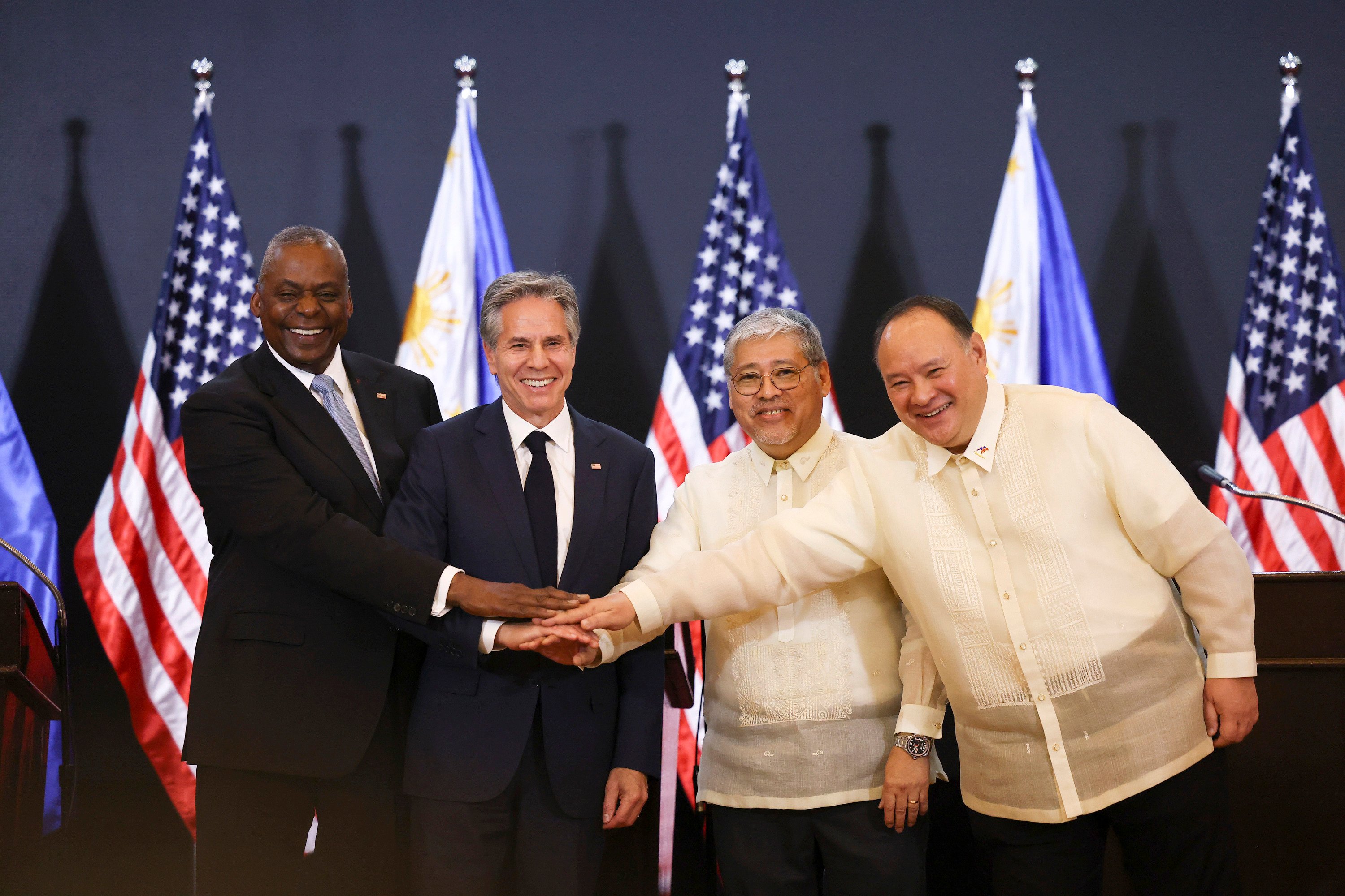 (From left) US Defence Secretary Lloyd Austin, Secretary of State Antony Blinken, Philippine Foreign Secretary Enrique Manalo and National Defence Secretary Gilberto Teodoro pose for a photo during a joint news conference after a foreign and defense ministerial meeting at Camp Aguinaldo in Manila, the Philippines, on July 30. Photo: AP