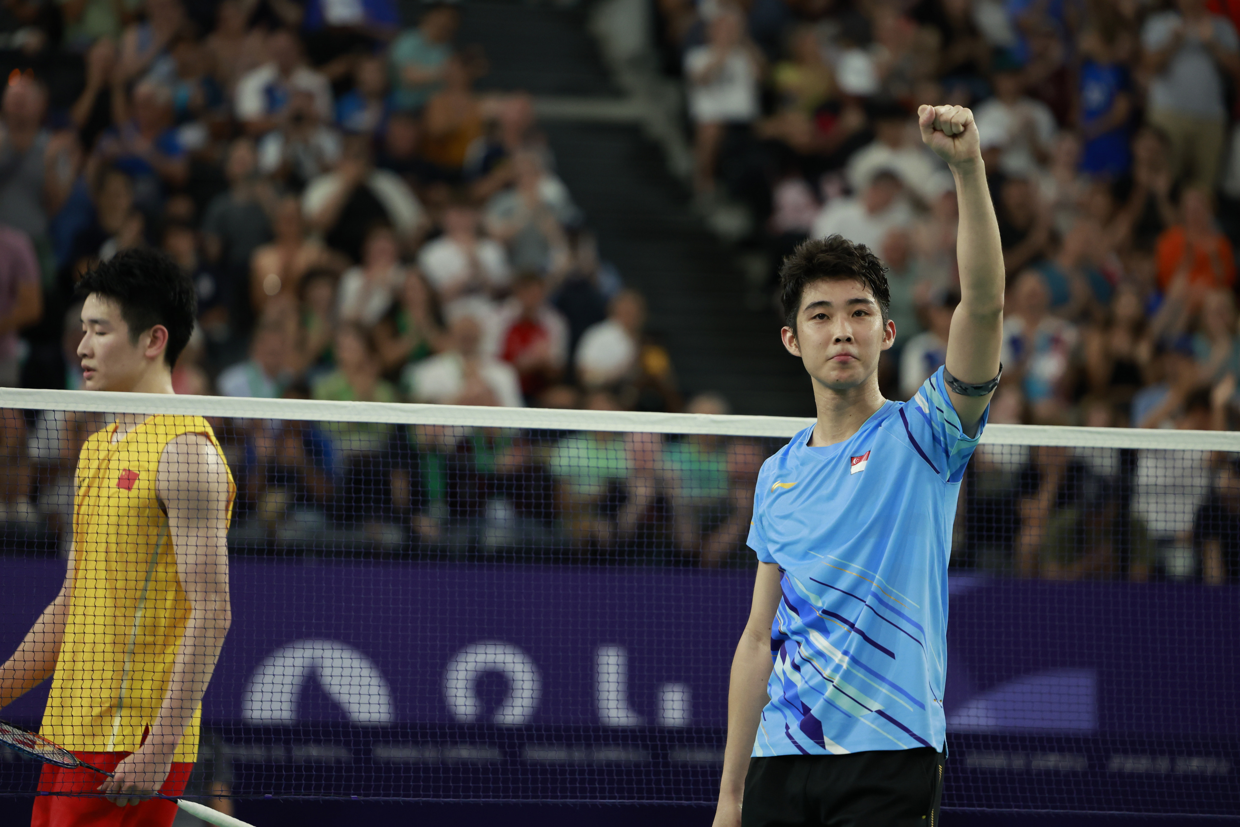 Loh Kean Yew has become an idol back home in Singapore after his victory over Li Shifeng in the badminton quarter-finals. Photo: Xinhua