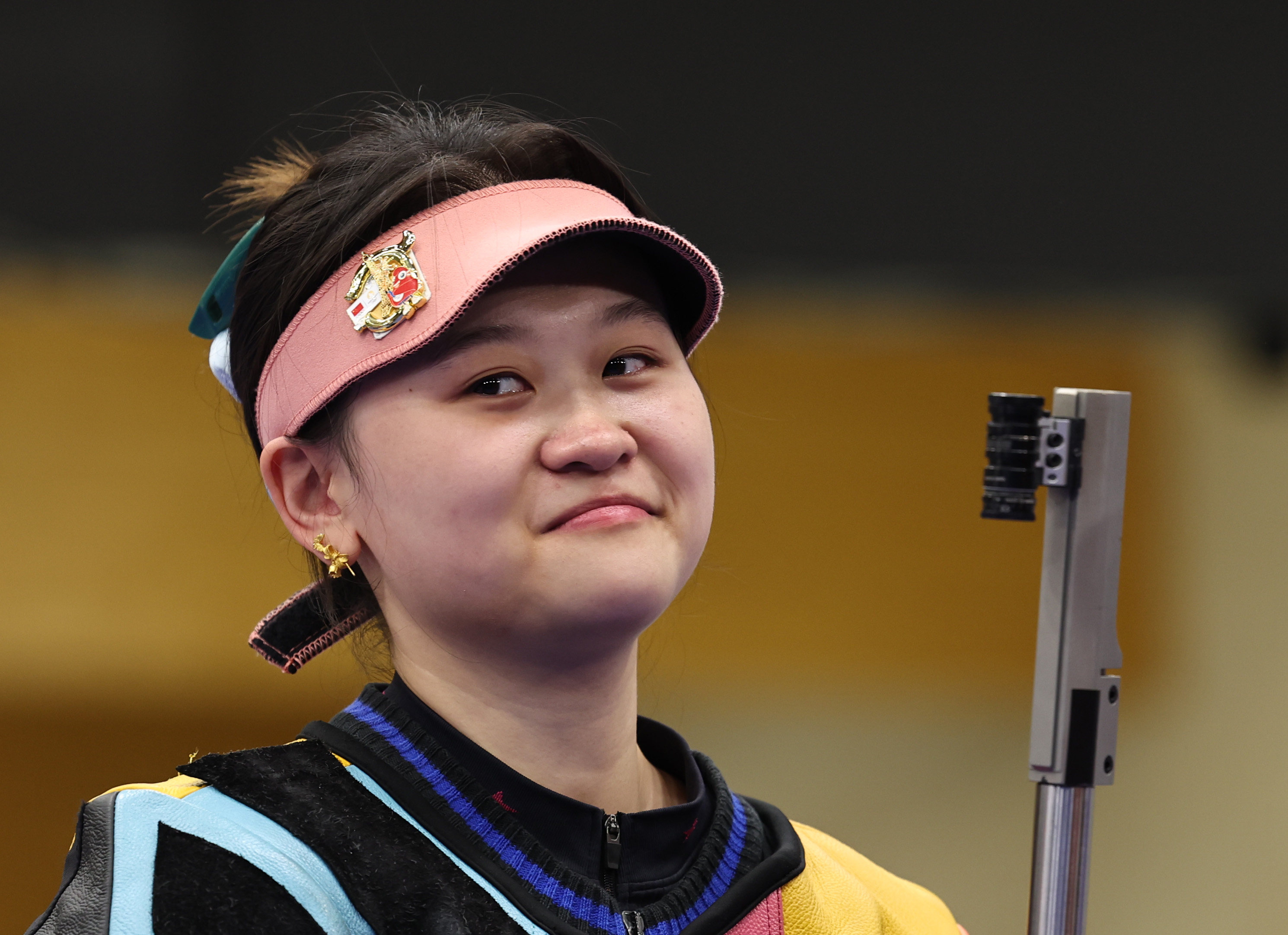 China’s Zhang Qiongyue made waves on Twitter because of the Hello Kitty stickers attached to her rifle. Photo: Xinhua