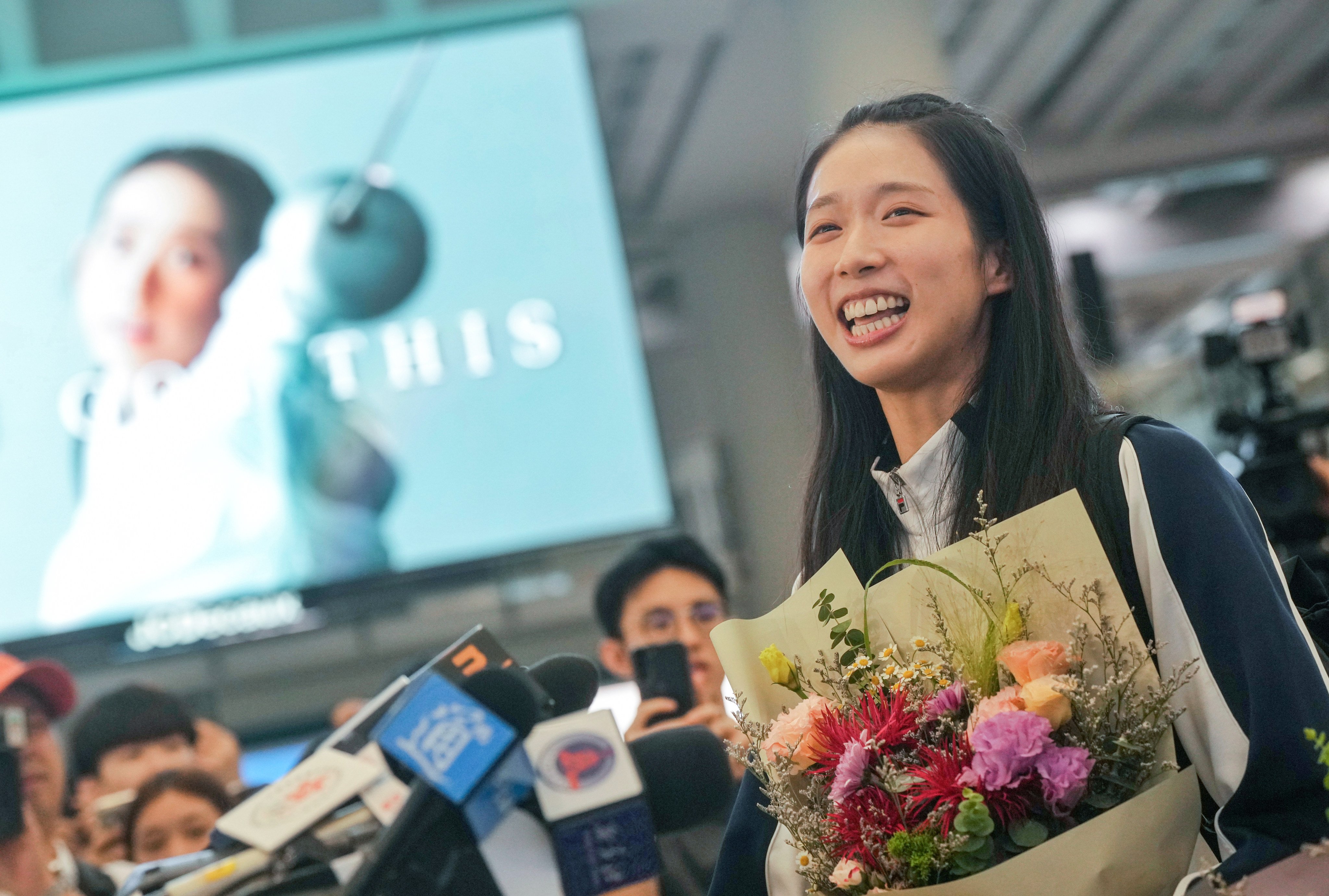 Olympic gold-medalist Vivian Kong receives a hero’s welcome at the Hong Kong International Airport on August 1. Photo: Elson Li