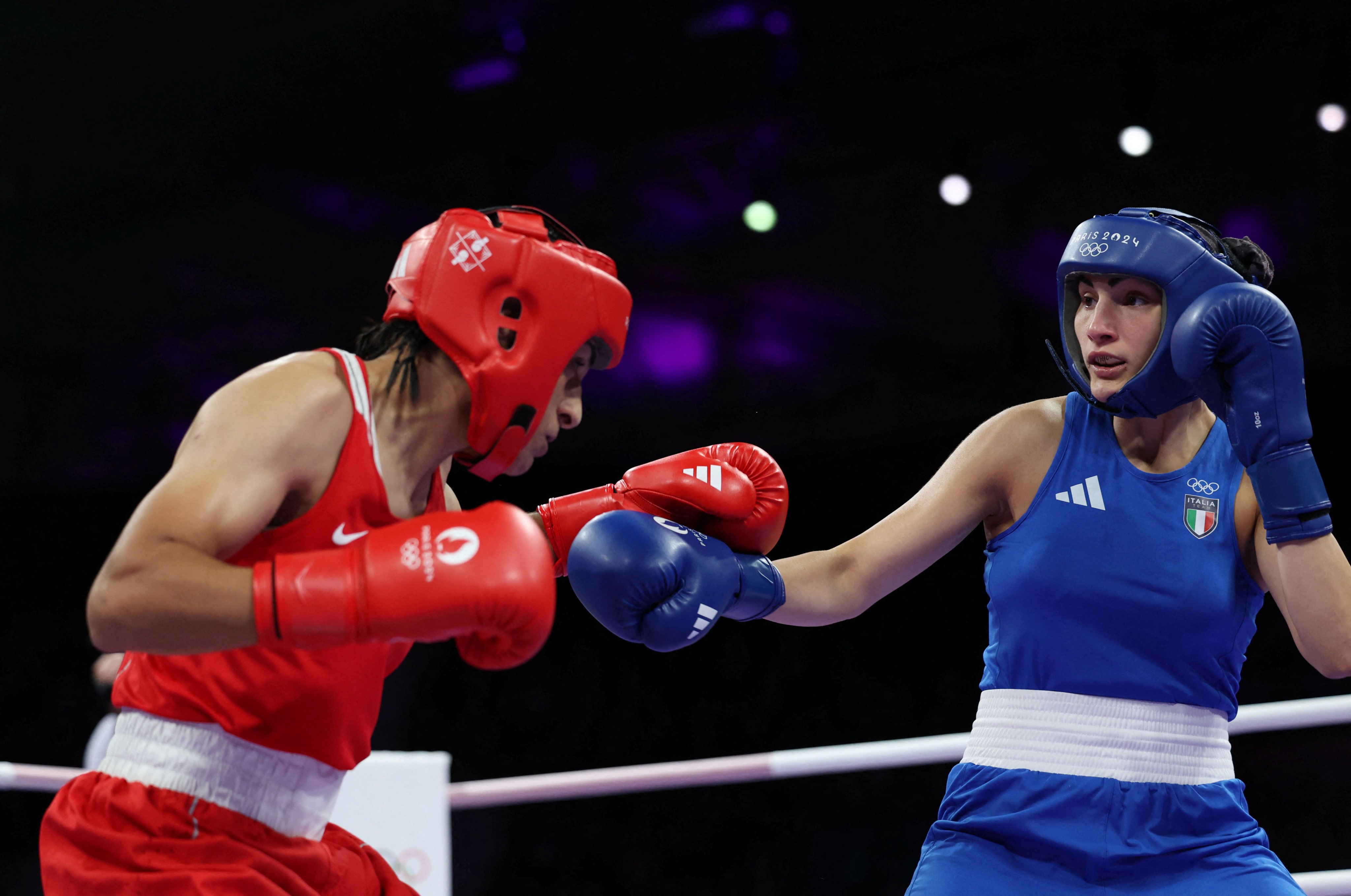 Angela Carini (right) quit her fight with Imane Khelif (left) after 46 seconds after receiving a punch to the head. Photo: Reuters