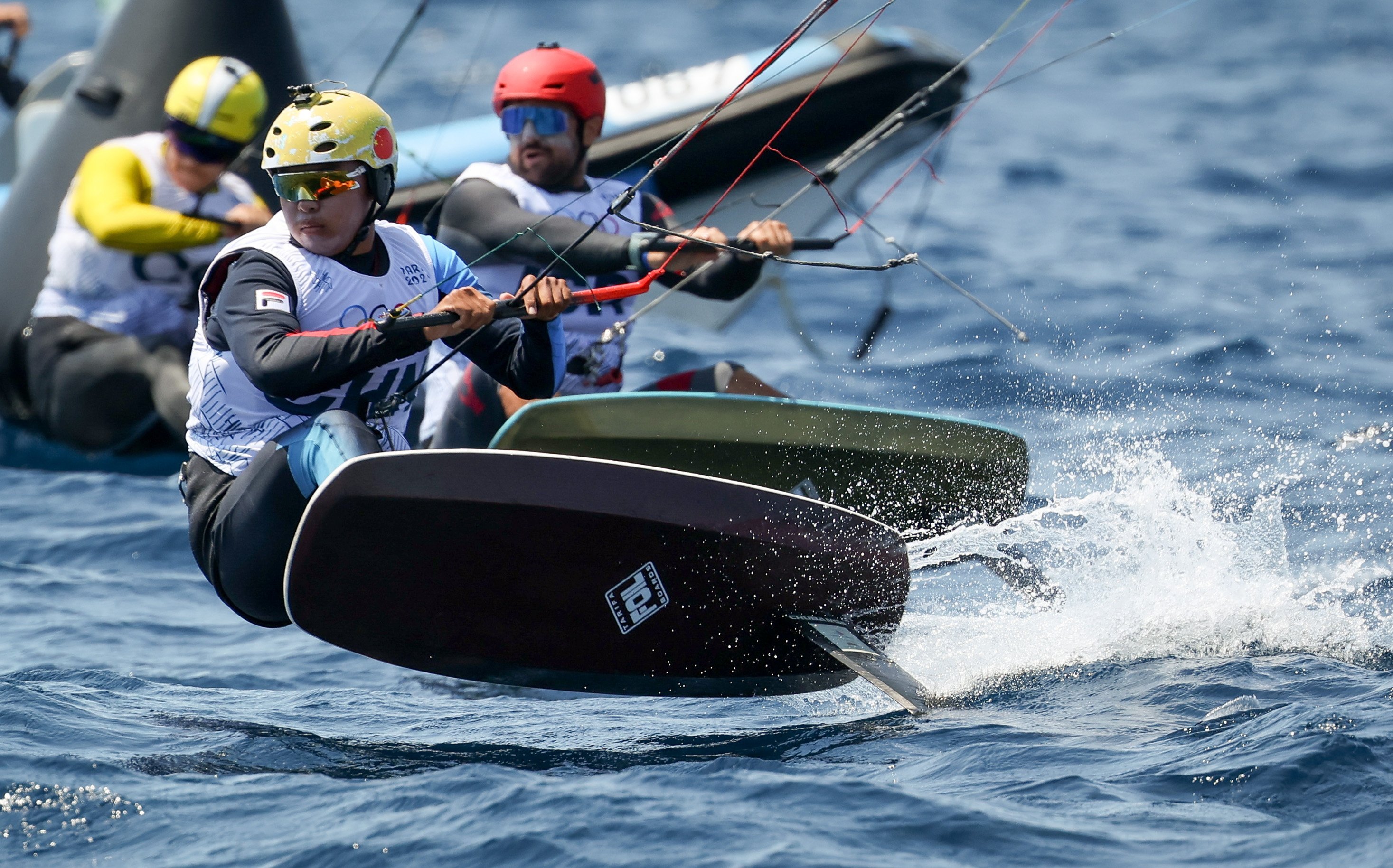 Qibin Huang of China in a Formula Kite practice session in Marseille before the competition begins. Photo: EPA-EFE