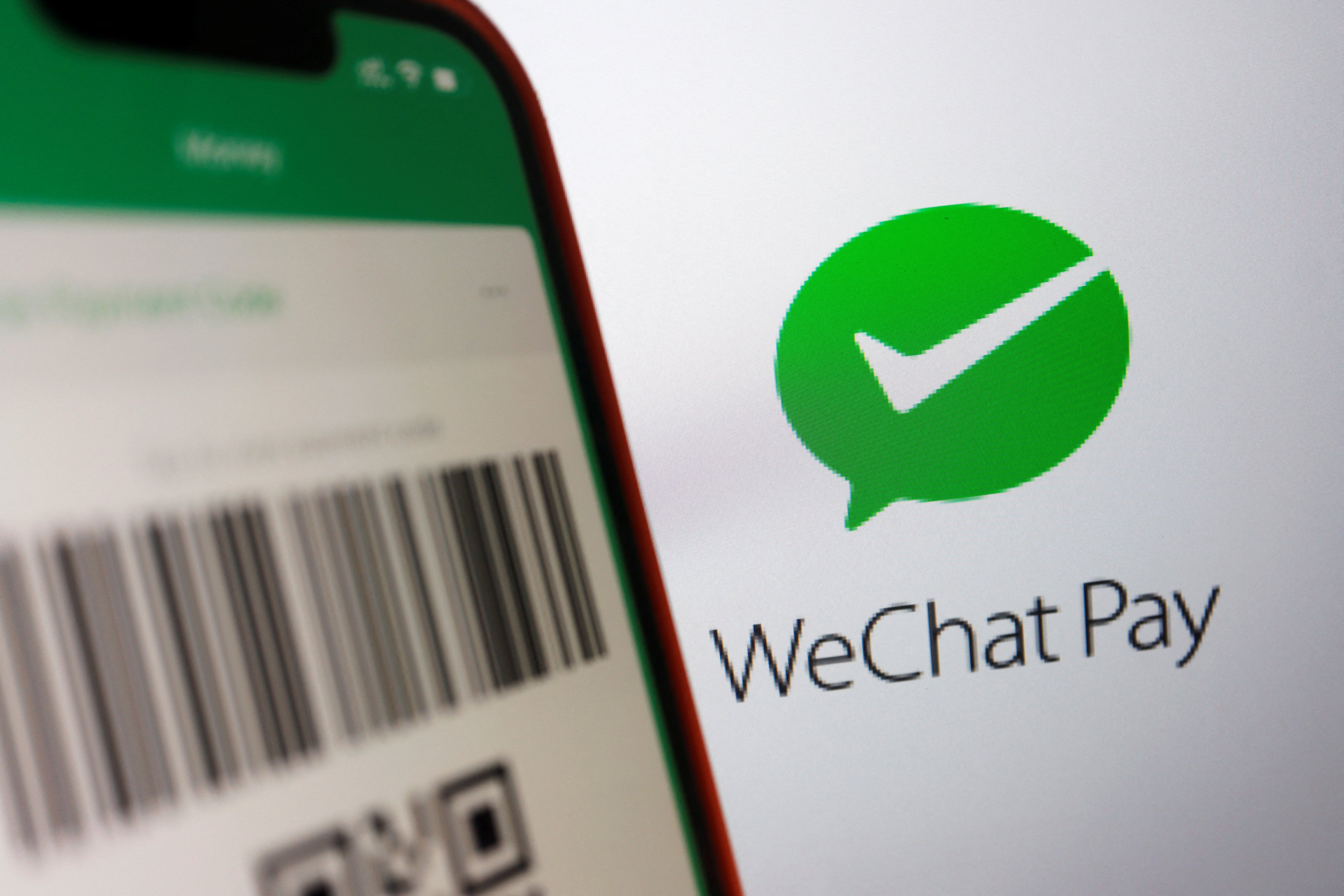 The WeChat Pay logo is displayed next to a QR payment code on the Wechat app, in this illustration picture taken June 28, 2023. Photo: Reuters