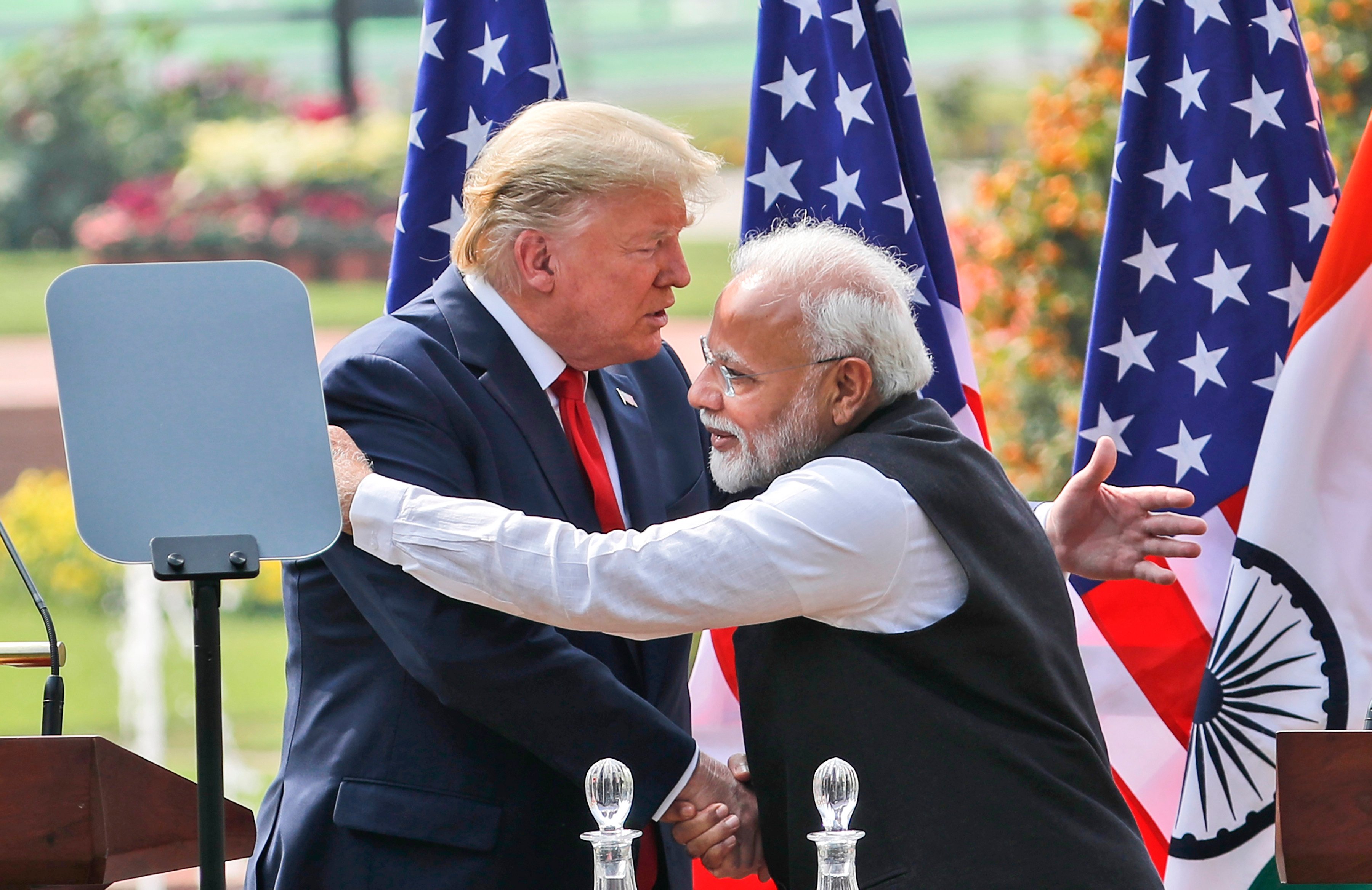 US President Donald Trump and Indian Prime Minister Narendra Modi embrace after giving a joint statement in New Delhi, India, in February 2020. Photo: AP