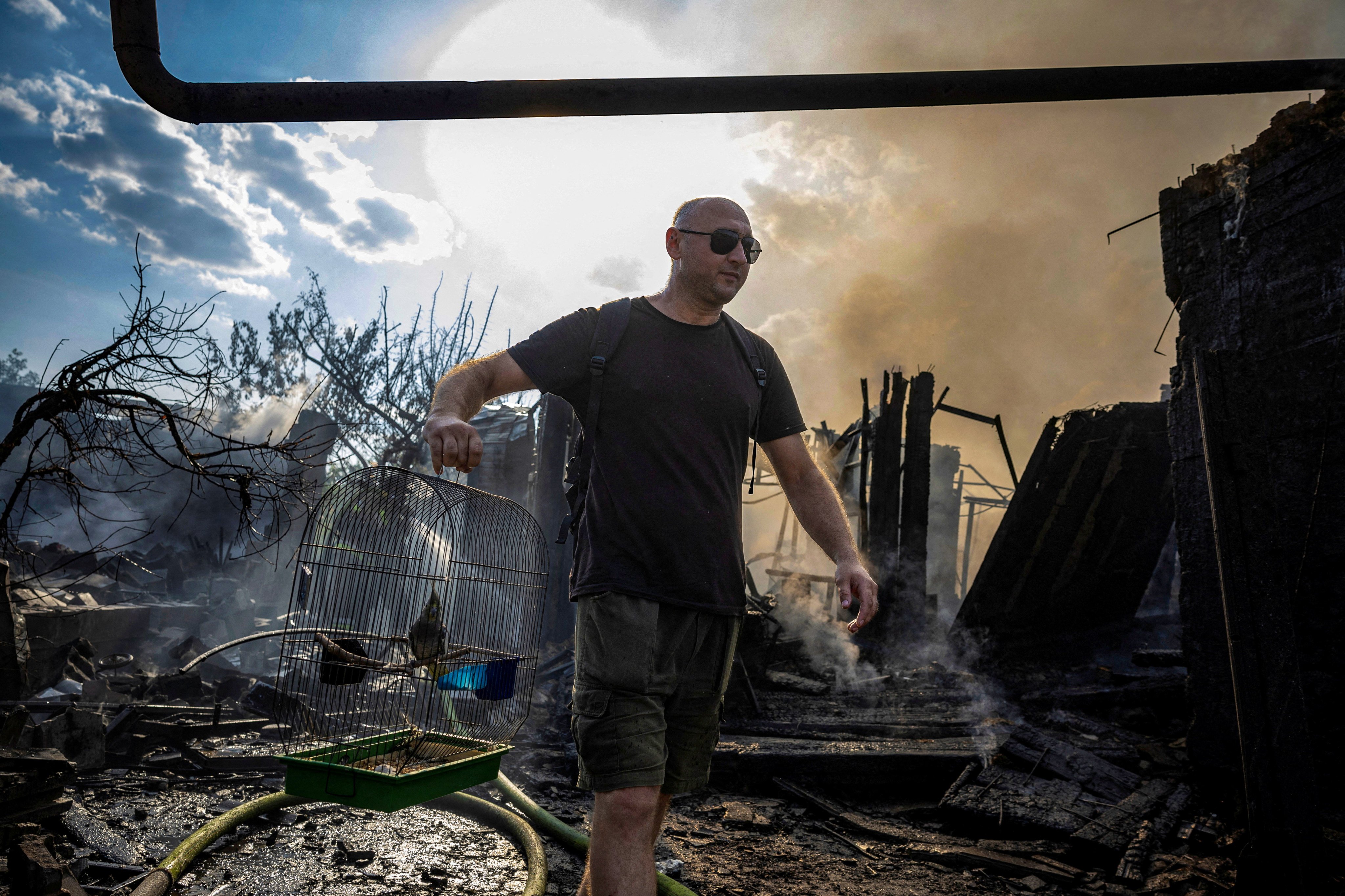 A pet bird is rescued from a house destroyed after a Russian strike on a residential area in Pokrovsk, eastern Ukraine, on Saturday. Photo: Reuters 