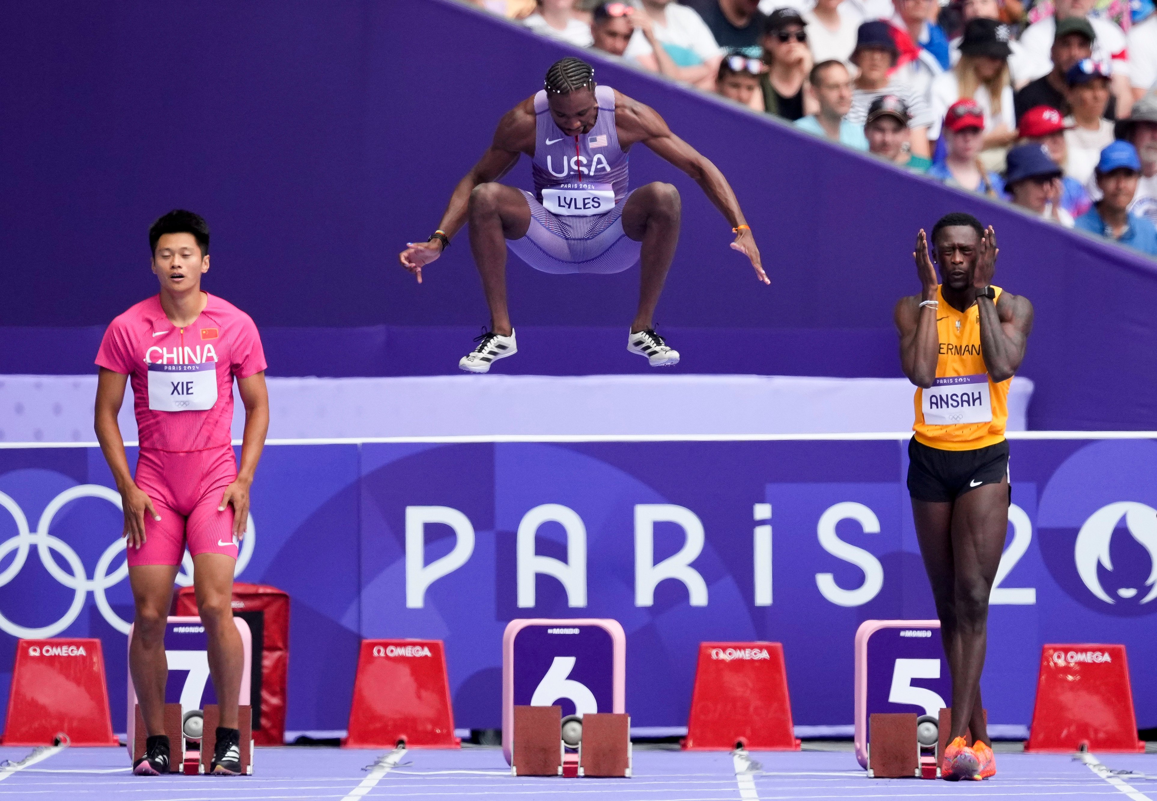 Noah Lyles (centre) is among the ones to watch in the men’s 100m final later today. Photo: AP