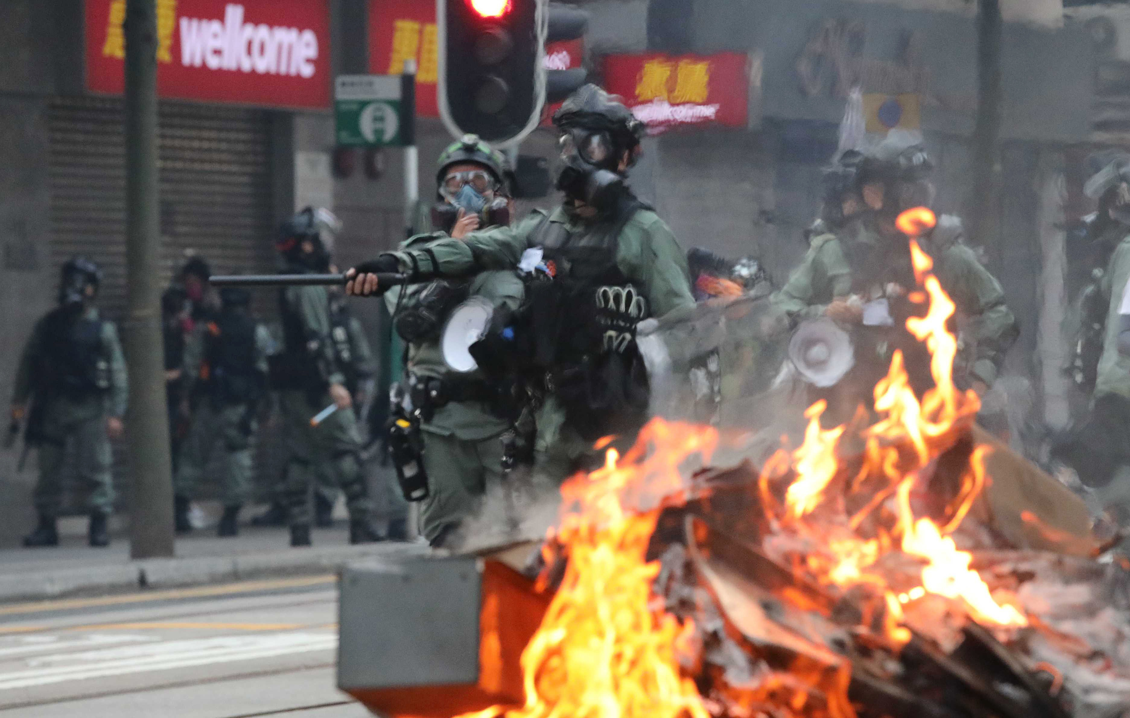 Police in riot gear face protesters in Wan Chai during the 2019 unrest. Photo: Felix Wong