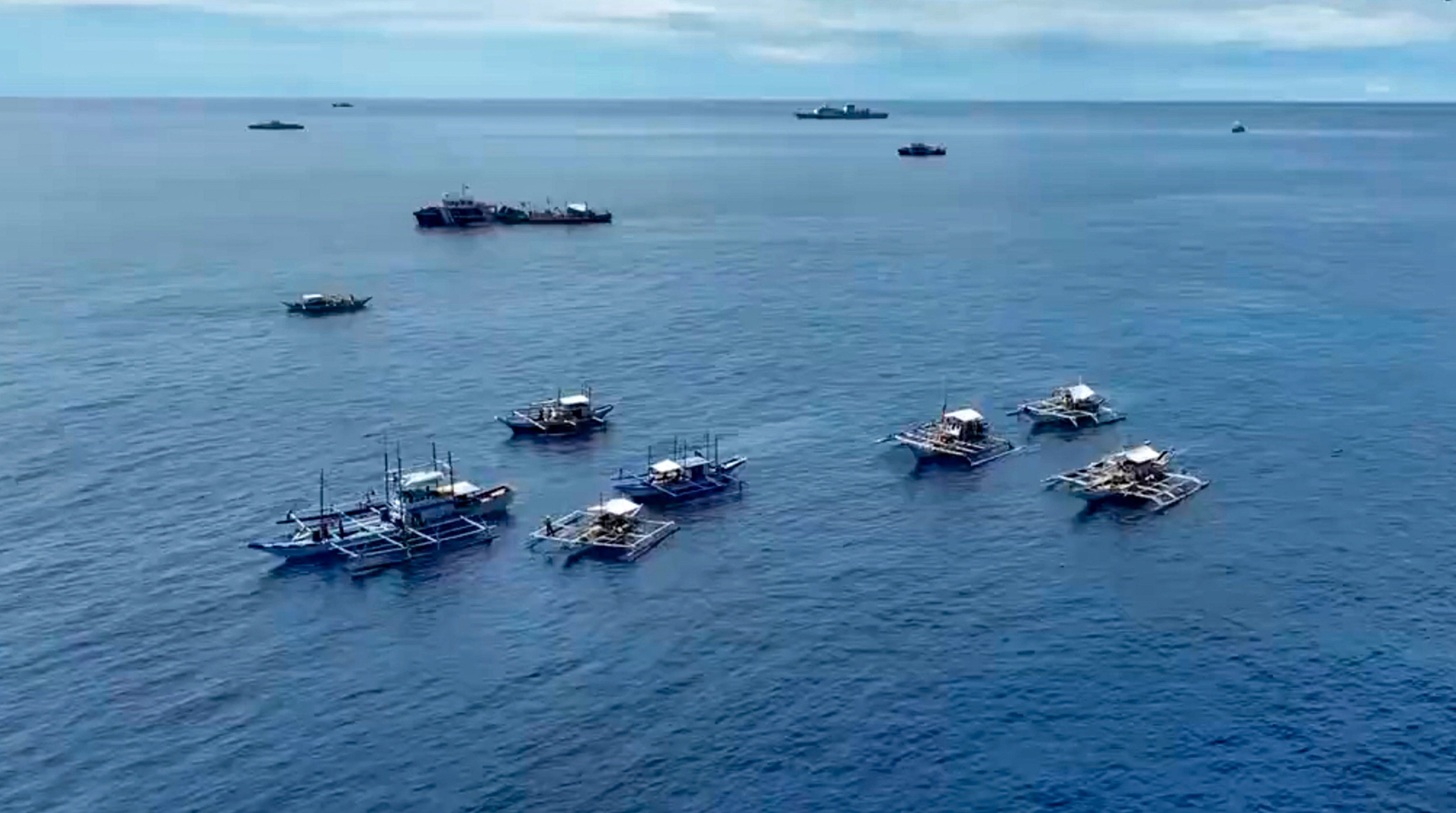 Philippine coastguard and Bureau of Fisheries and Aquatic Resources vessels on a fuel assistance mission to the Sabina Shoal in the South China Sea. Photo: Philippine Coast Guard