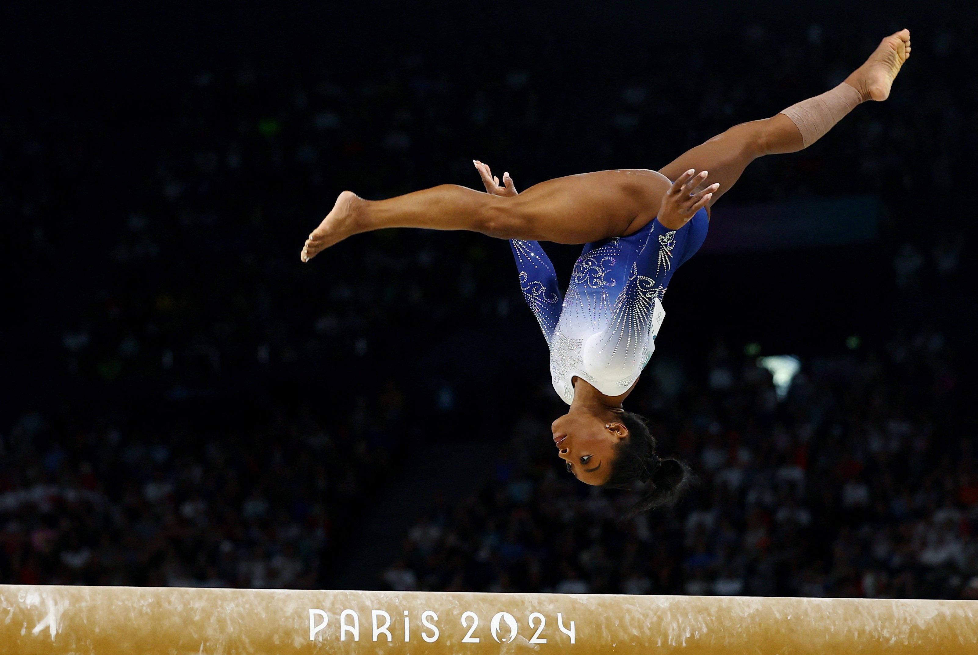 Simone Biles competes in the women’s balance beam final. Photo: Reuters