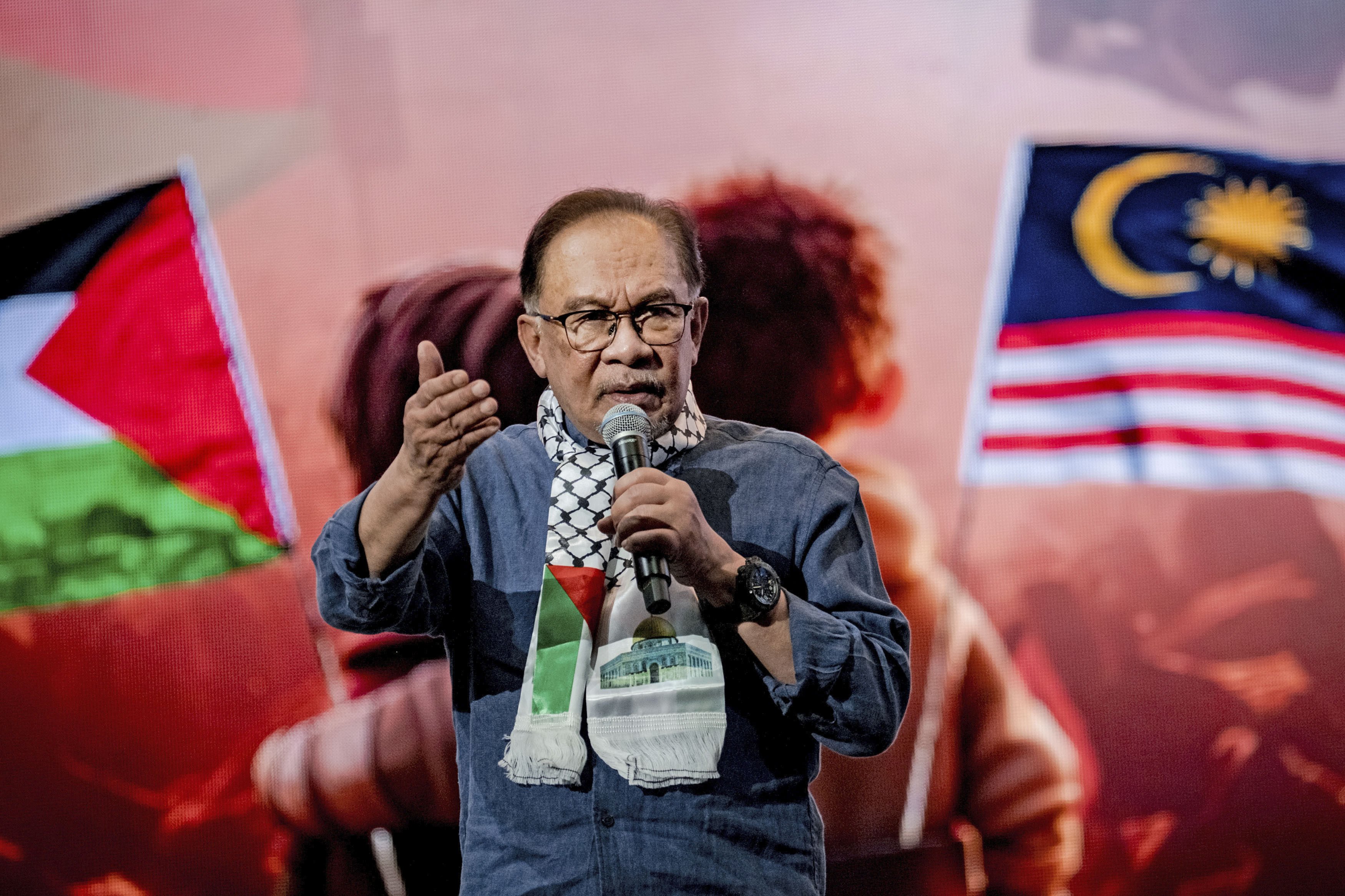 Malaysian Prime Minister Anwar Ibrahim delivers a speech in Kuala Lumpur on Sunday. Photo: Kyodo