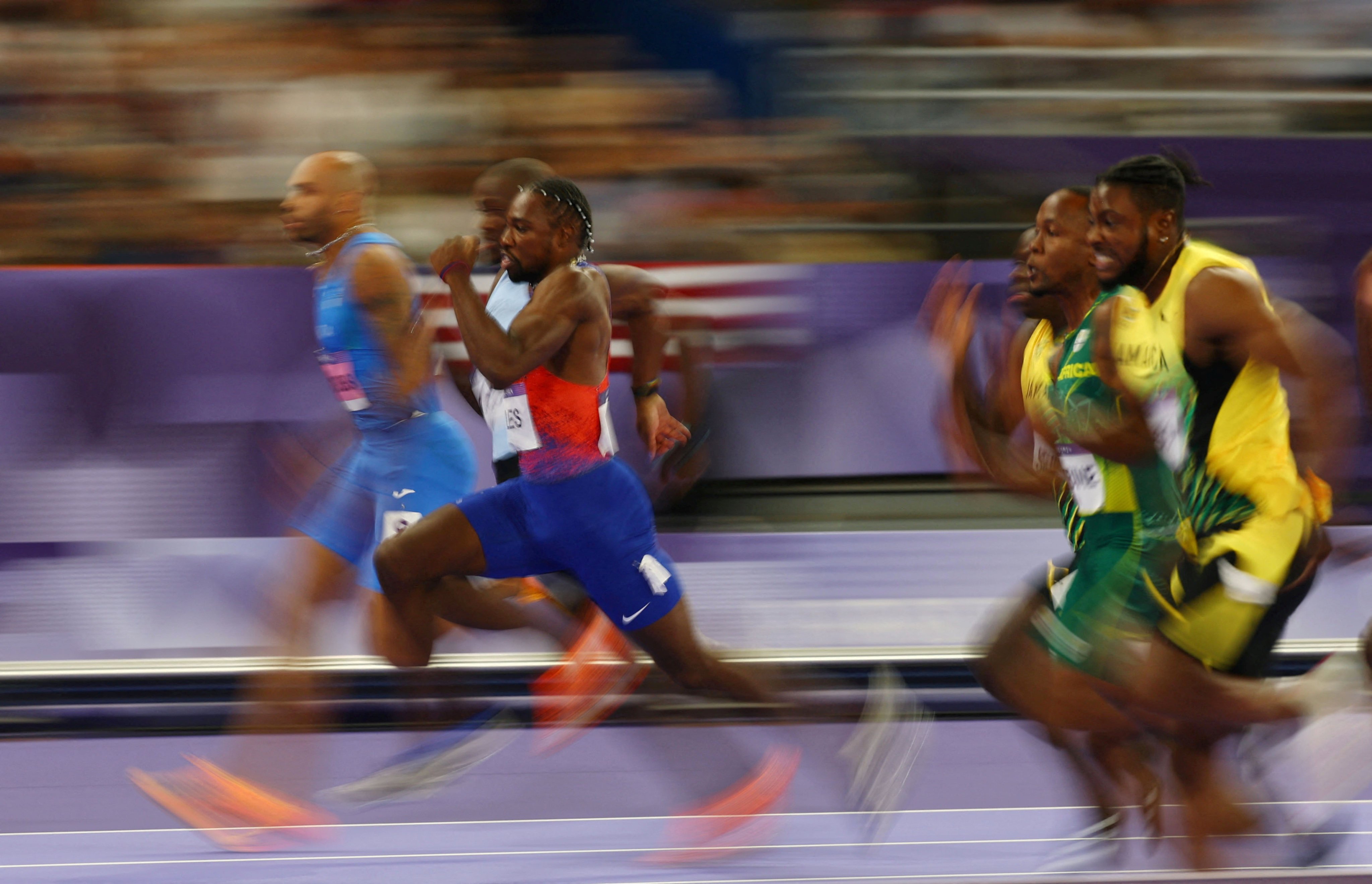 Noah Lyles and Kishane Thompson race for the line in the men’s 100m. Photo: Reuters