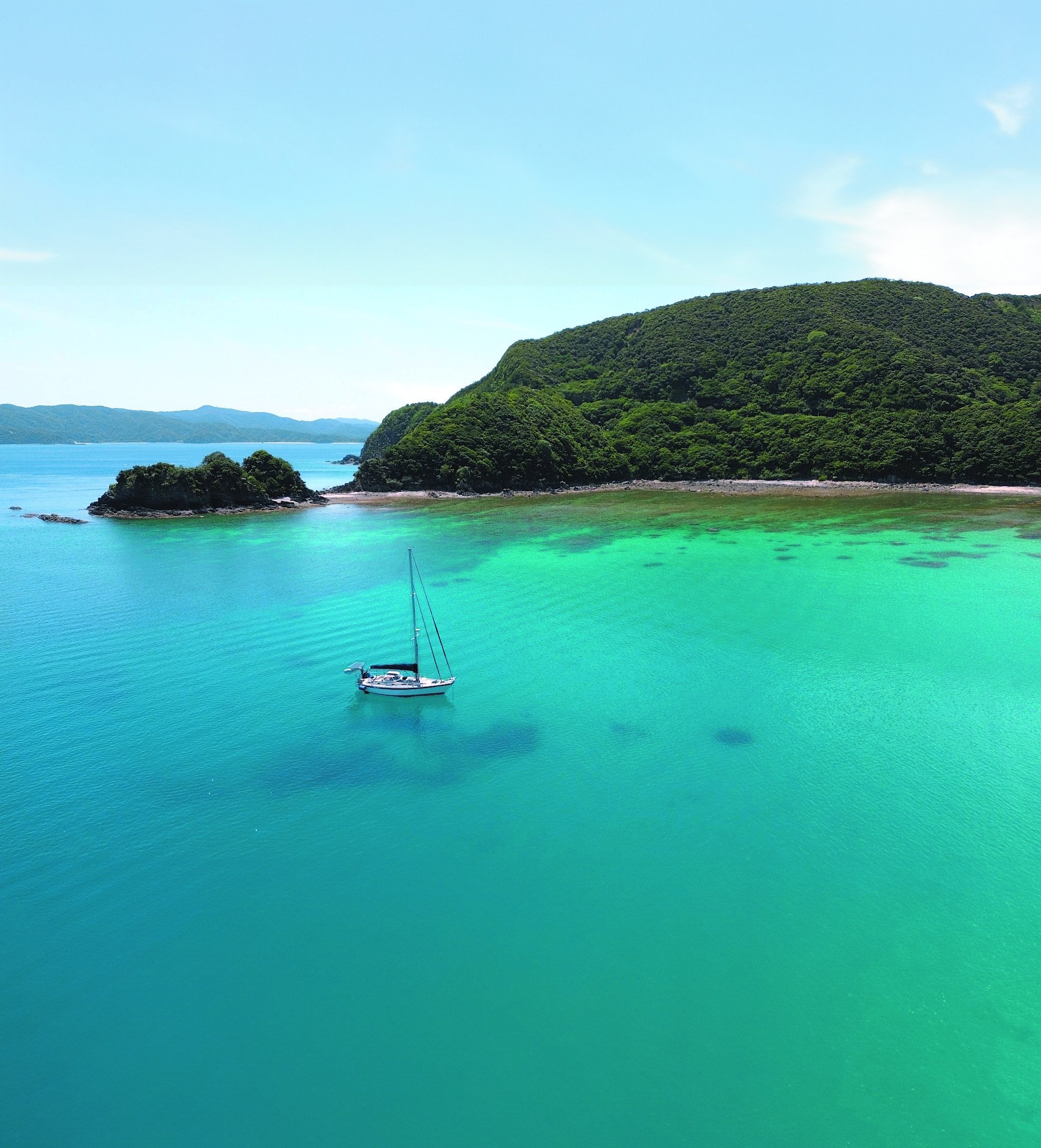 Embarking on a new life afloat, a couple formerly based in Hong Kong found their sea legs on a voyage to Taiwan, then on to Japan. Pictured is their boat Teng Hoi at anchor in Amami, Japan. Photo: Cameron Dueck