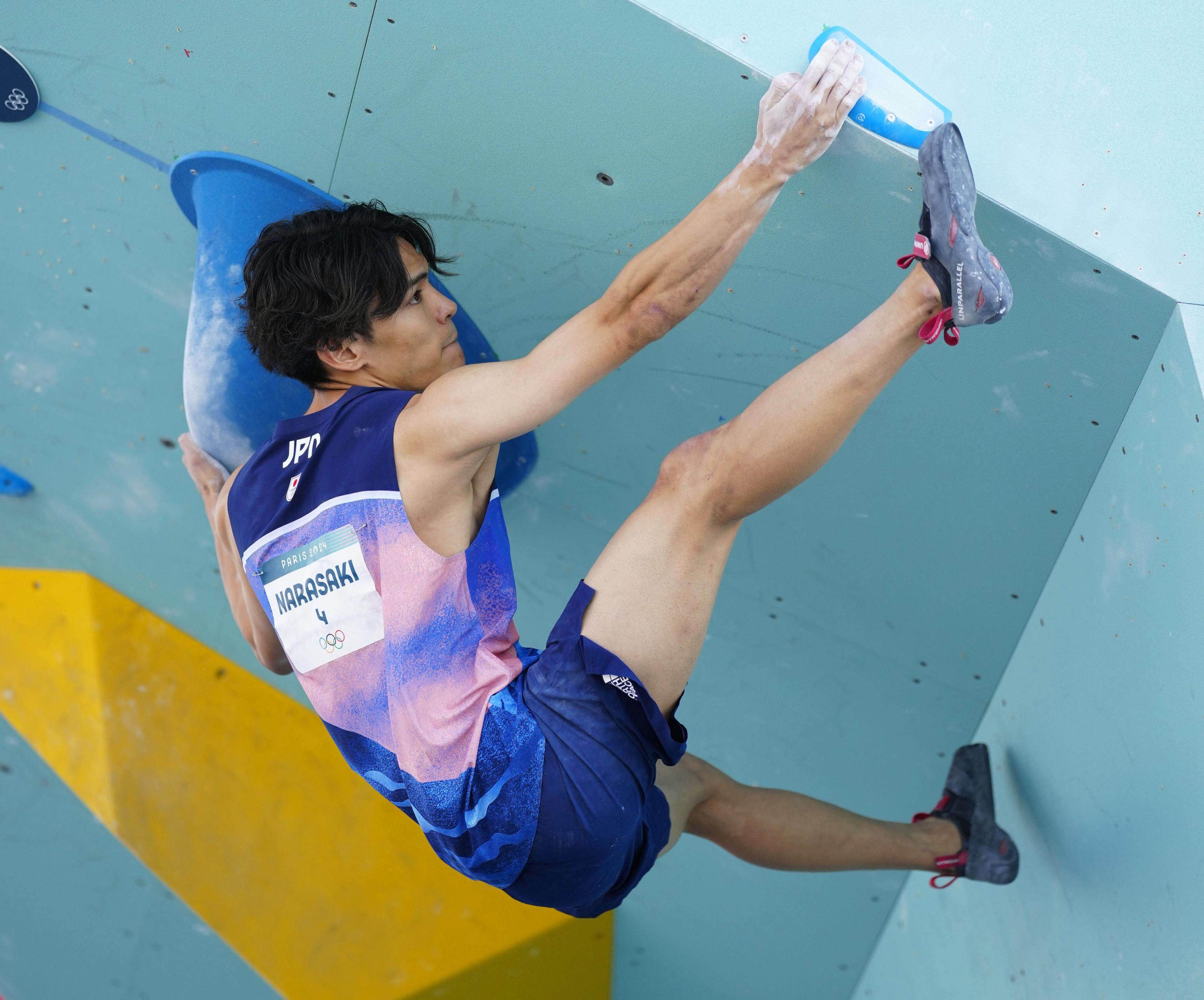 Tomoa Narasaki of Japan in the bouldering semifinals at Le Bourget near Paris. Photo: Kyodo