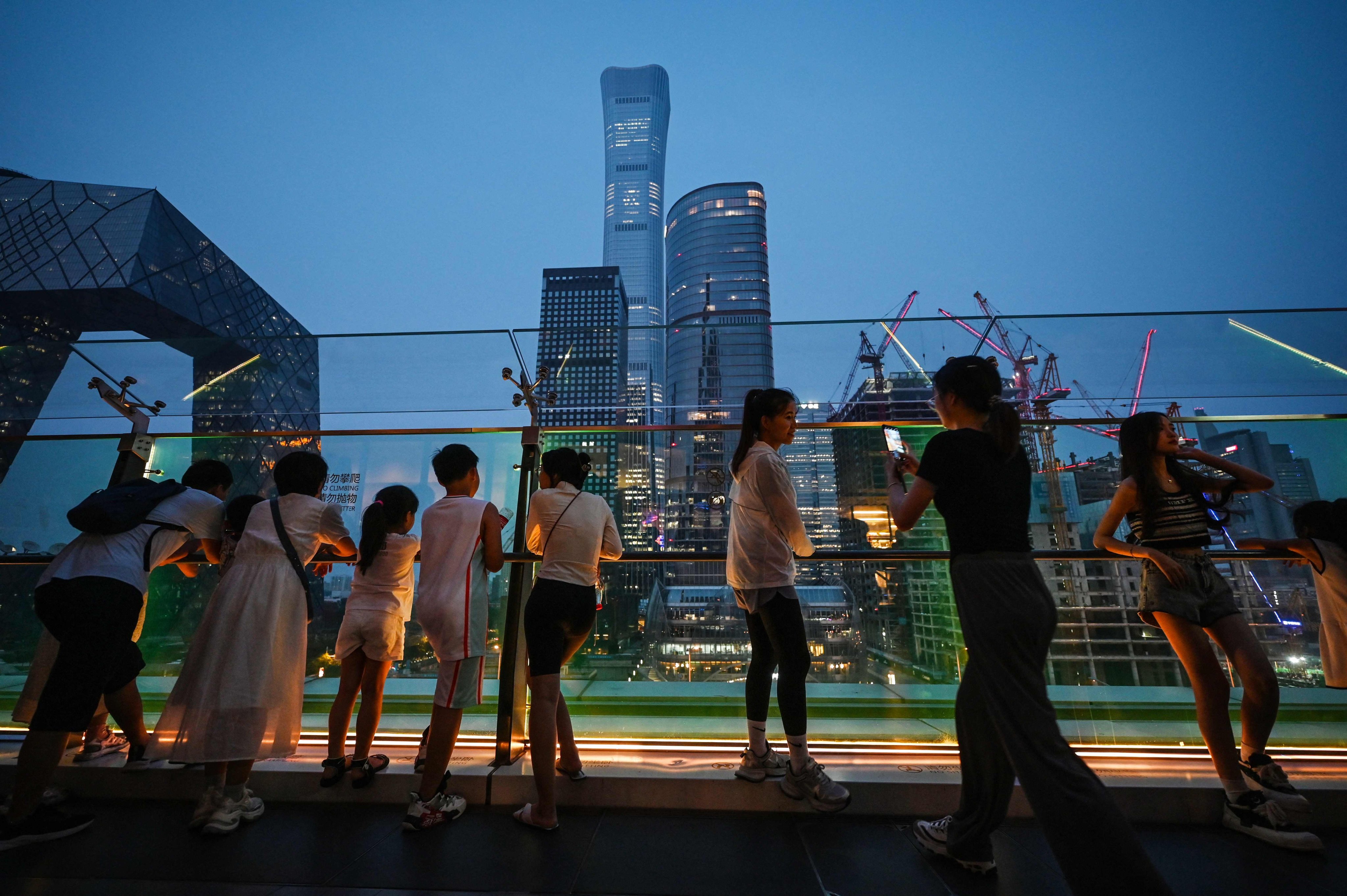 Beijing’s commercial buildings, viewed from a platform in a shopping mall in central business district in July 2024. Photo: AFP