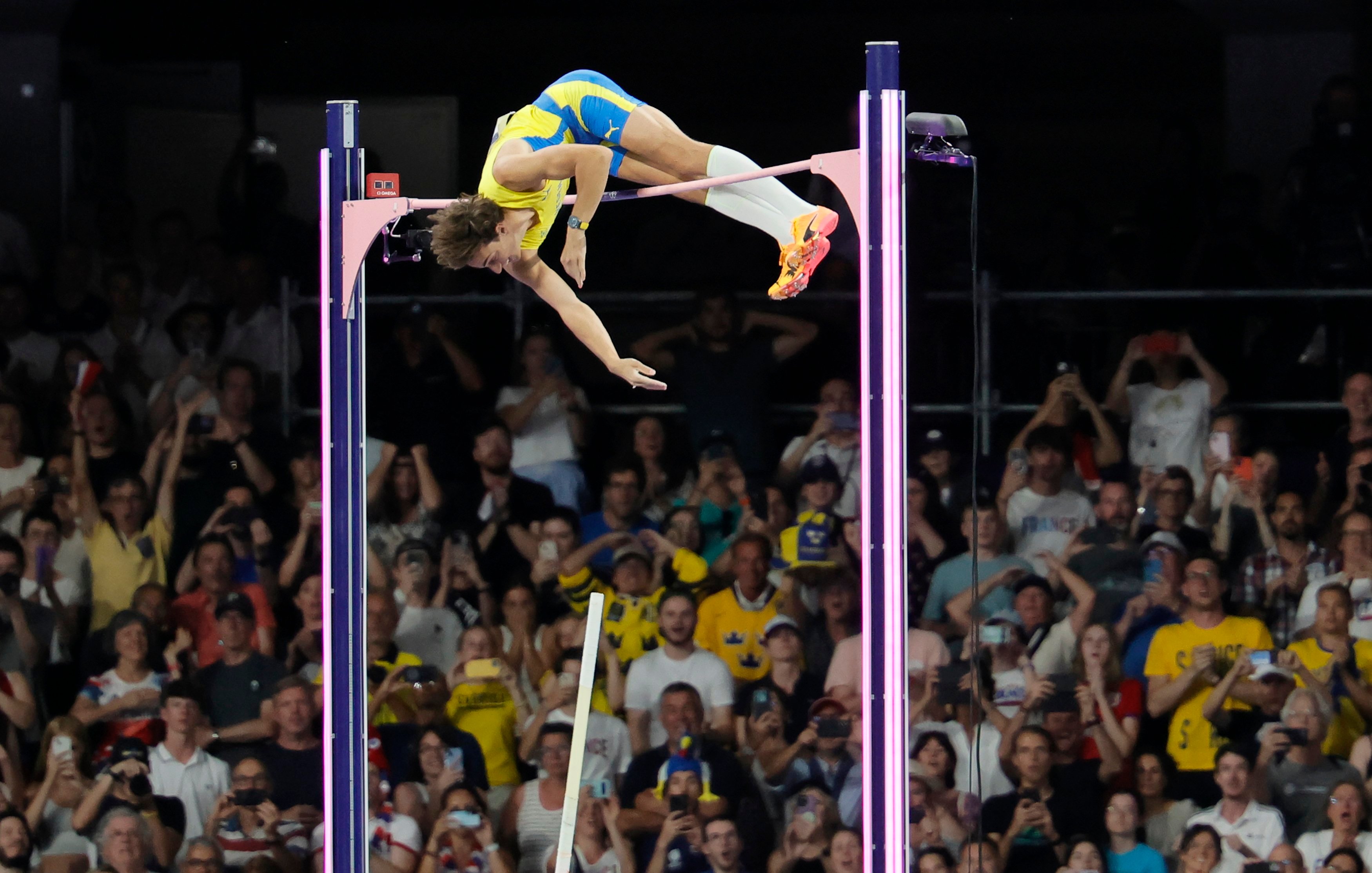 Mondo Duplantis of Sweden clears the bar at 6.25m to set a new world record in the men’s pole vault. Photo: EPA-EFE