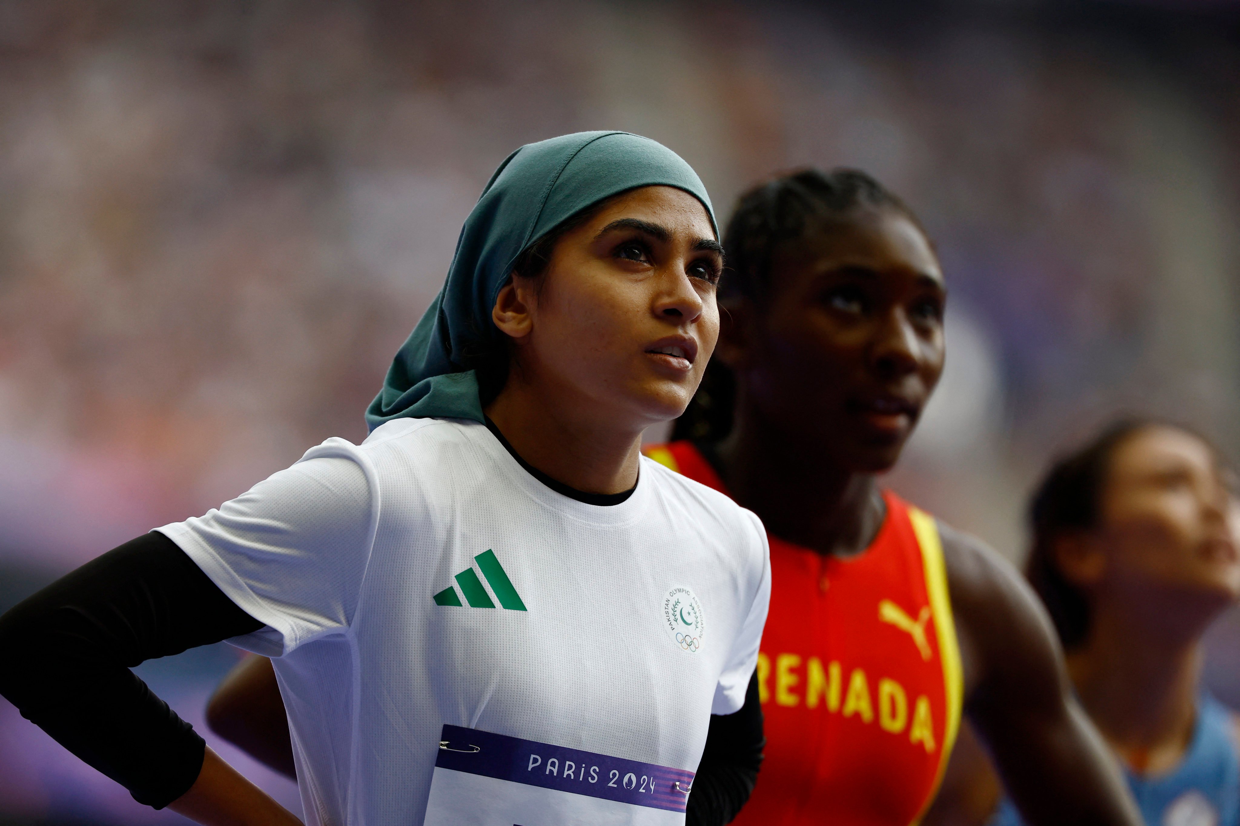 Pakistani Olympic sprinter Faiqa Riaz reacts to the results of her race, the women’s 100m preliminary round, in Paris, France on August 2. Photo: Reuters  