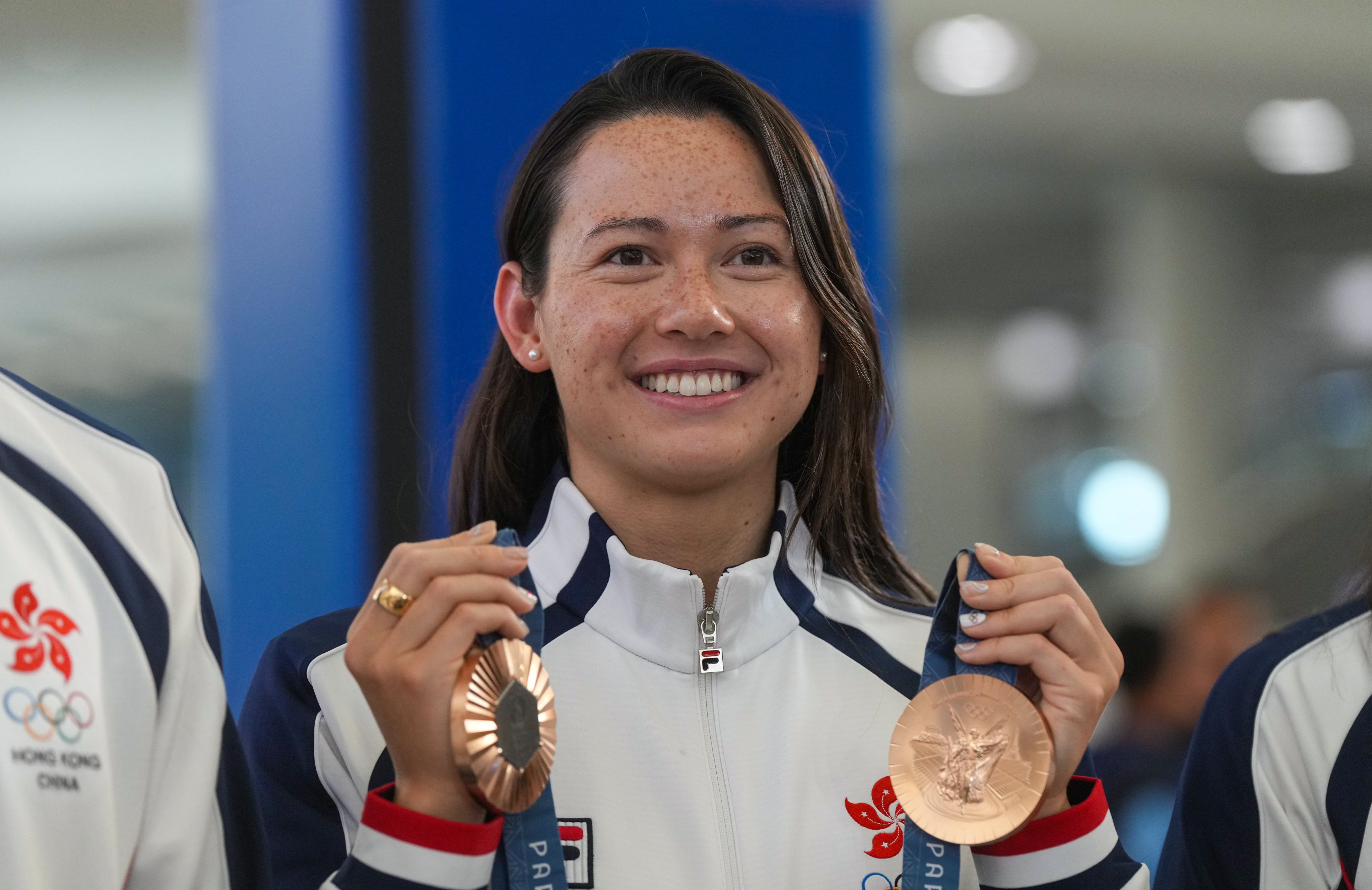 Hong Kong swimming queen Siobhan Haughey displays her medals. Photo: Elson Li