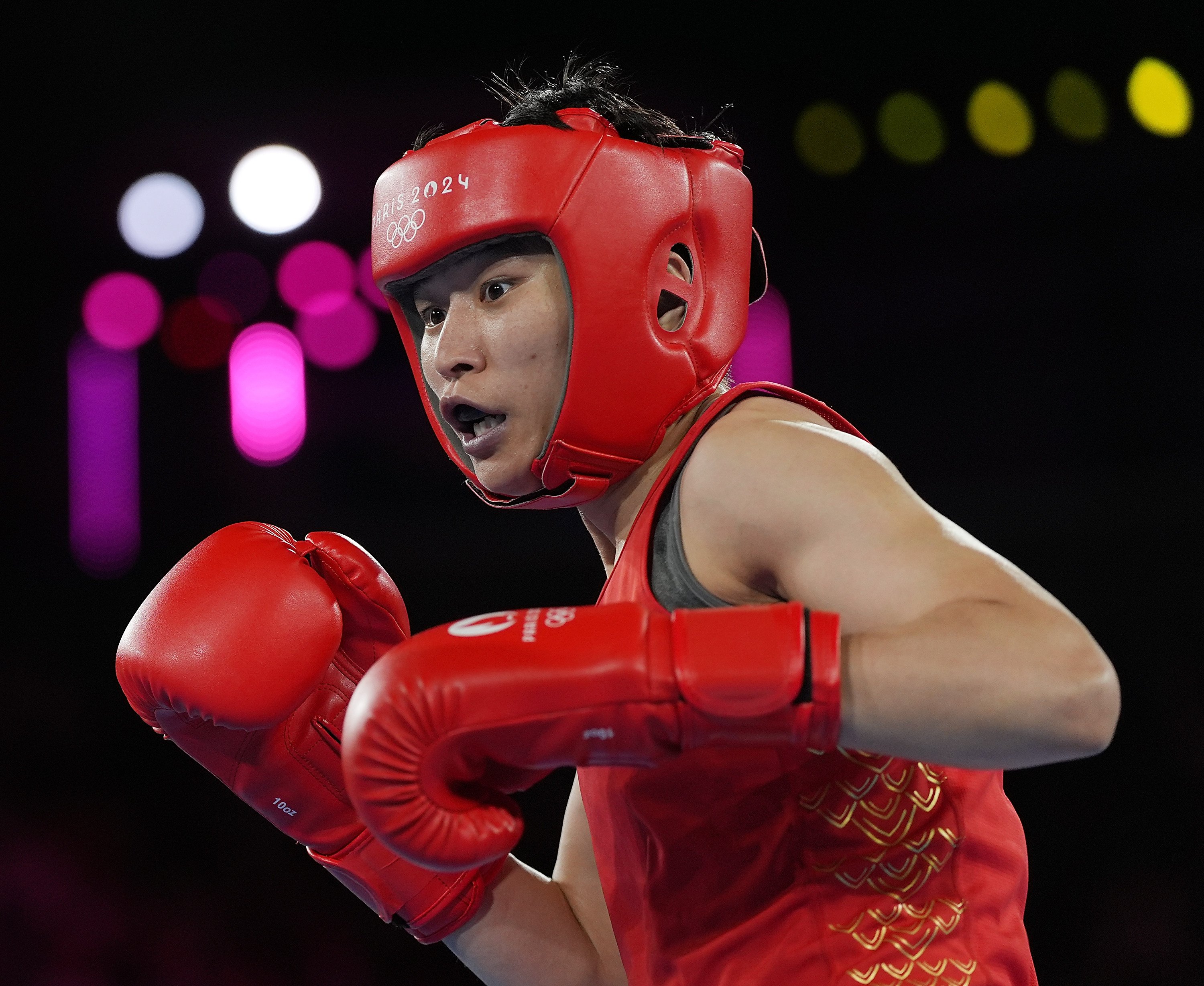 Yang Wenlu in action in her 60kg boxing final in Paris. Photo: Xinhua