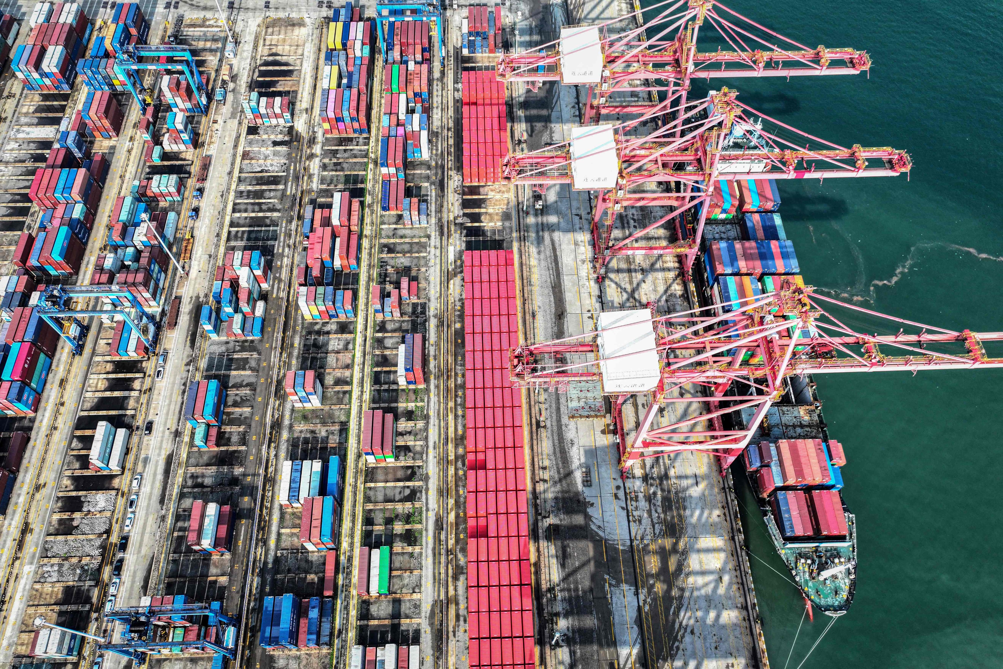 A cargo ship loaded with containers berths at a port in Lianyungang, in eastern China’s Jiangsu province. Photo: AFP