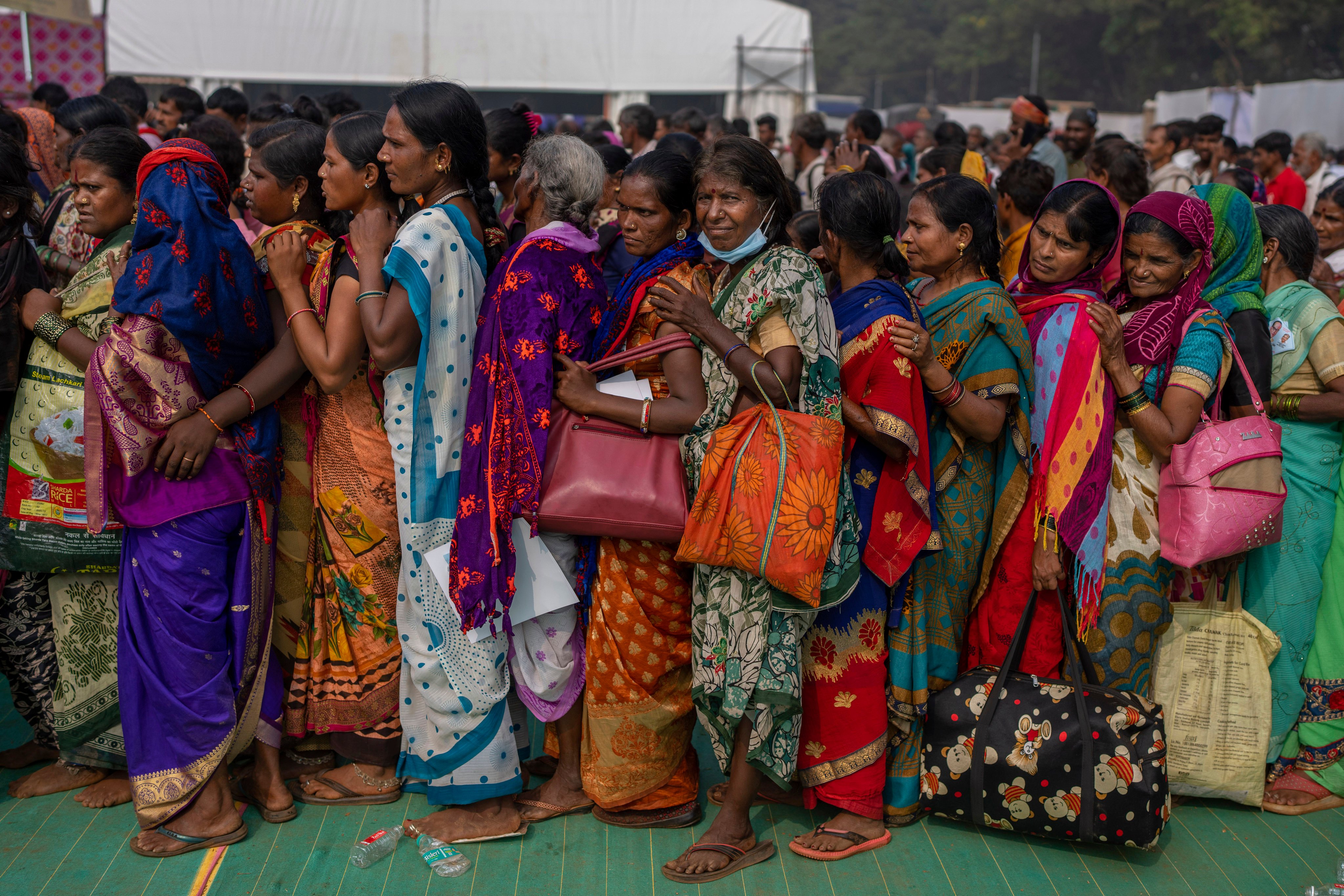 Indian women wait for a free medical check up in Mumbai. India last conducted a general census in 2011. Photo: AP