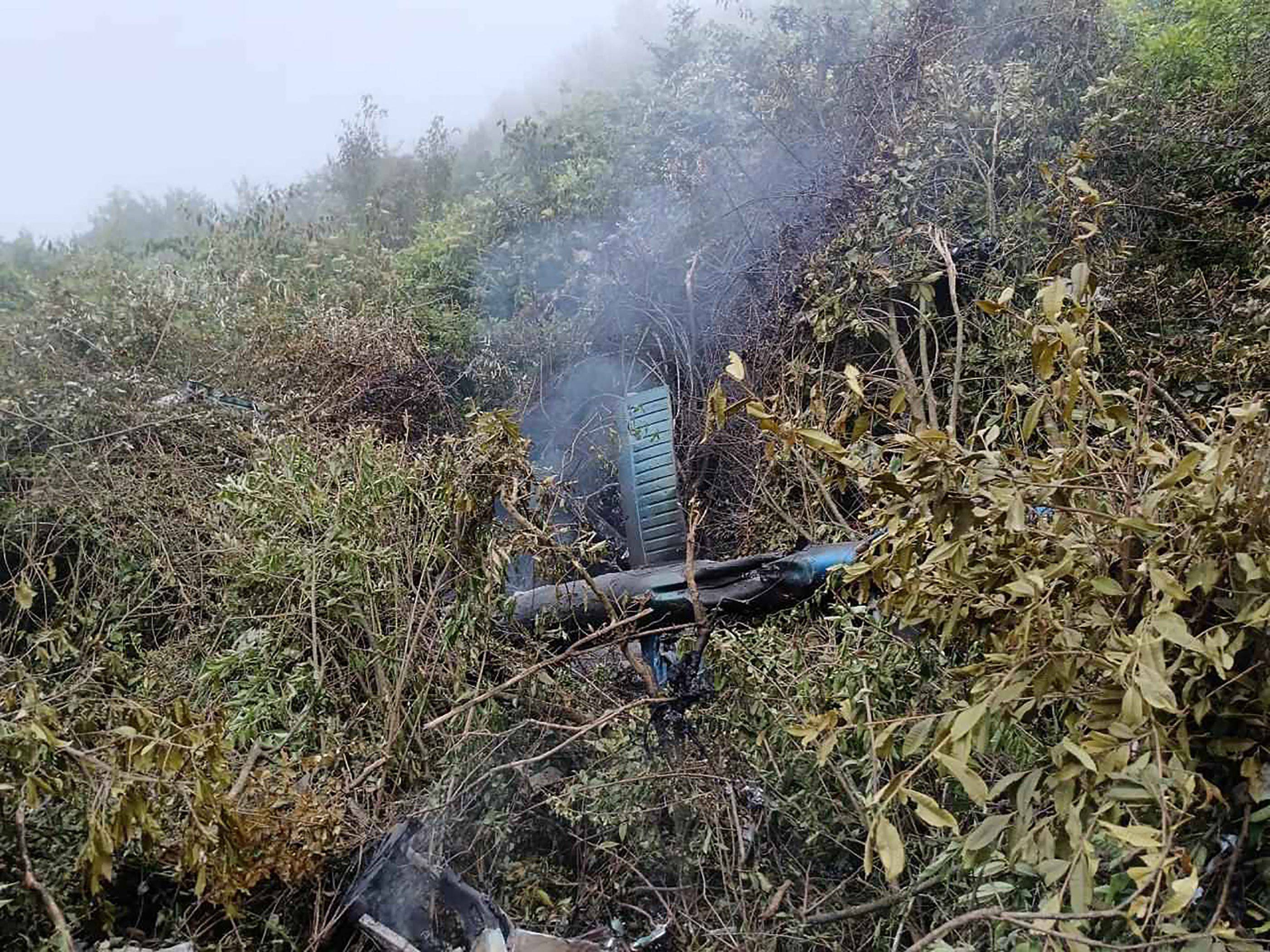 The remains of an Air Dynasty chopper that crashed on the outskirts of Kathmandu. Photo: Nepalese Army/AFP