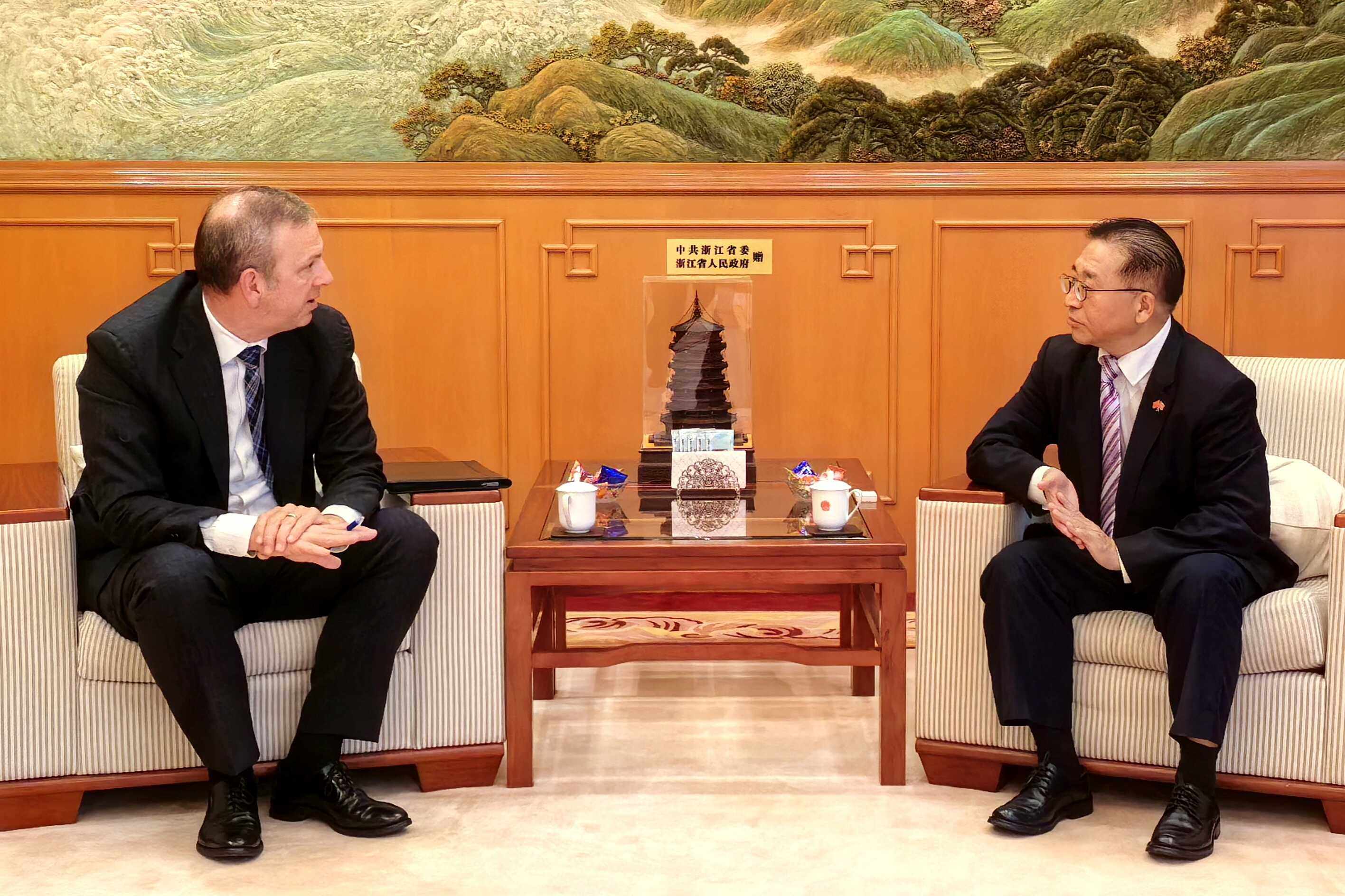 Cui Jianchun (right), the commissioner of the Chinese foreign ministry’s office in Hong Kong, meets US envoy Gregory May. Photo: Handout