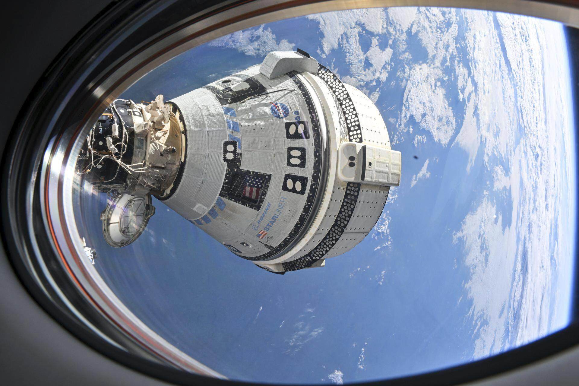 Boeing’s Starliner spacecraft is seen docked at the International Space Station in July. Photo: Nasa via AP