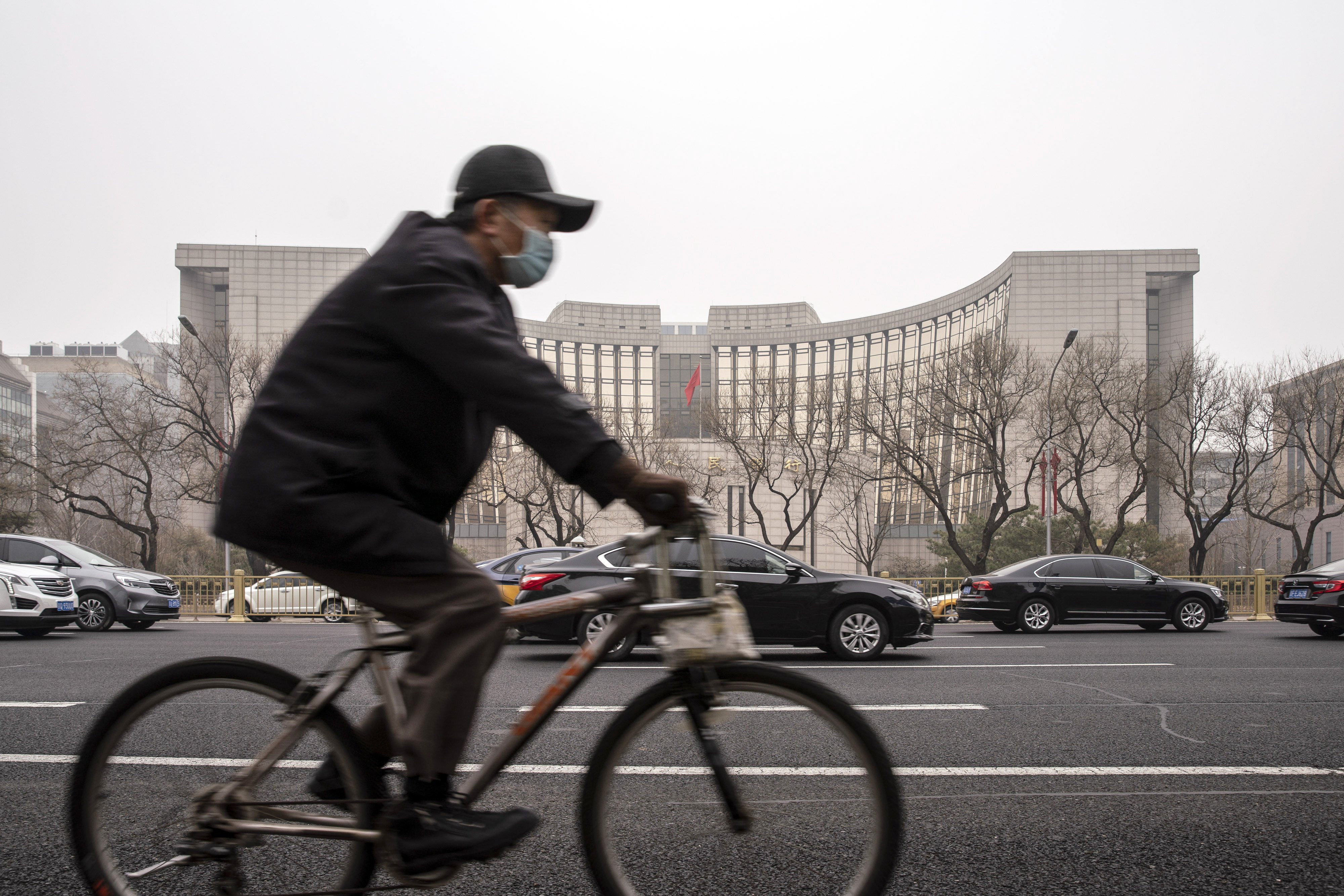 An affiliate of the People’s Bank of China (pictured) has announced a self-disciplinary investigation into four rural commercial banks. Photo: Bloomberg