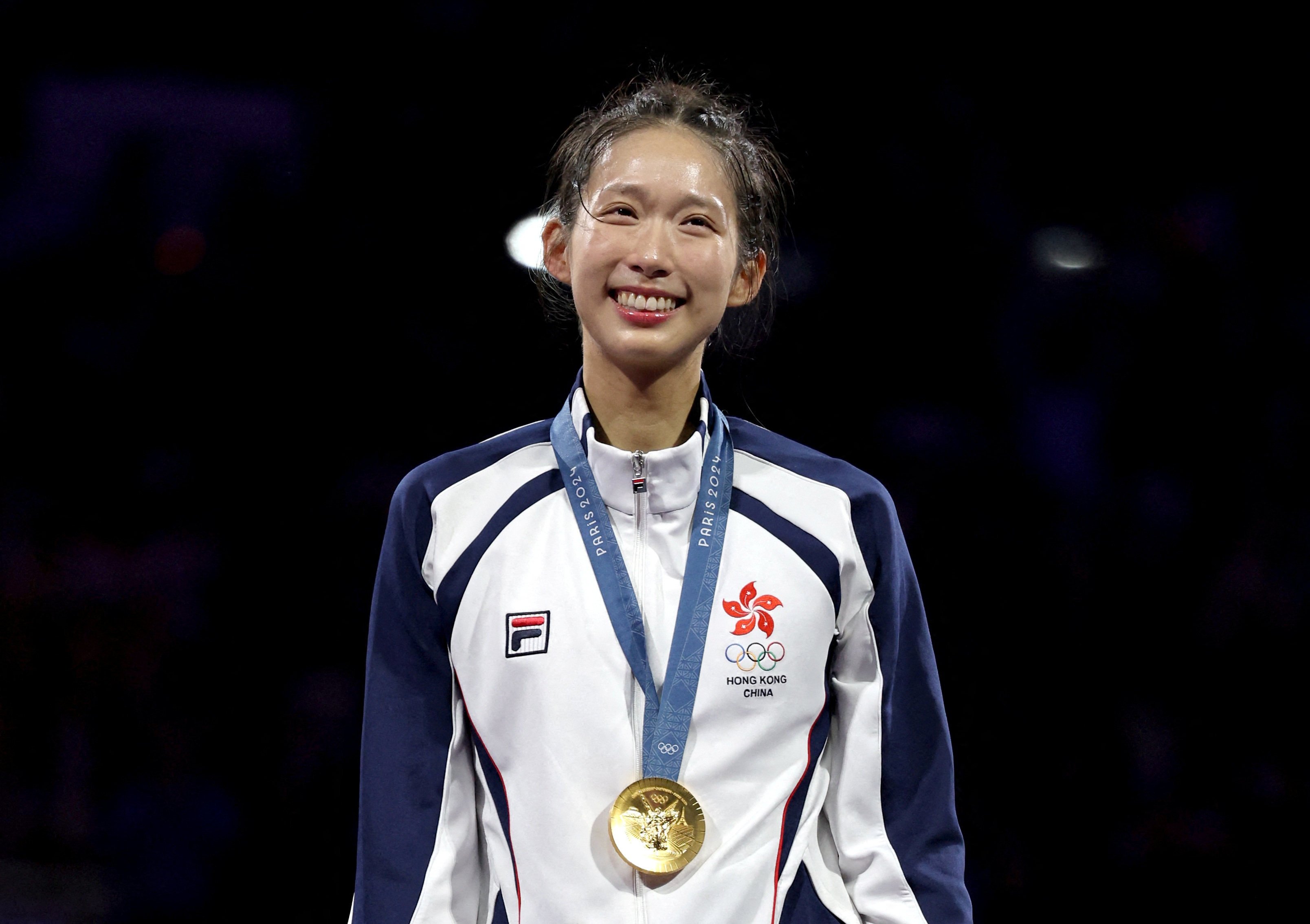 Along with the pride that comes with winning a gold medal, fencer Vivian Kong will also earn $HK6m in prize money. Photo: Reuters