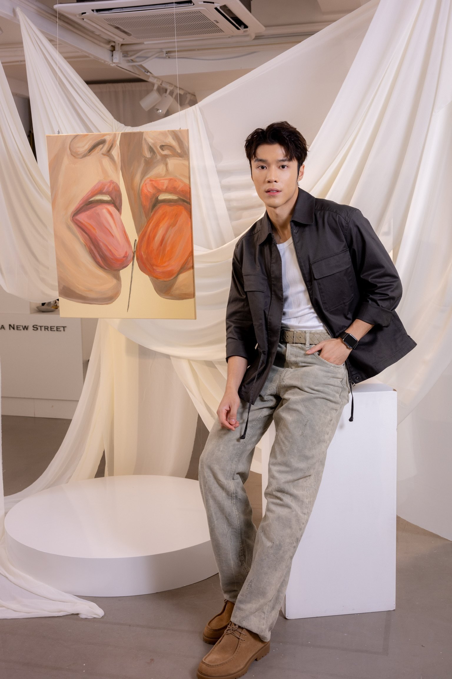 Hong Kong actor and artist Karl Ting at “Who Are You?”, his first solo art show. His paintings explore identity, love and societal pressure. Photo: 13A New Street Art Gallery