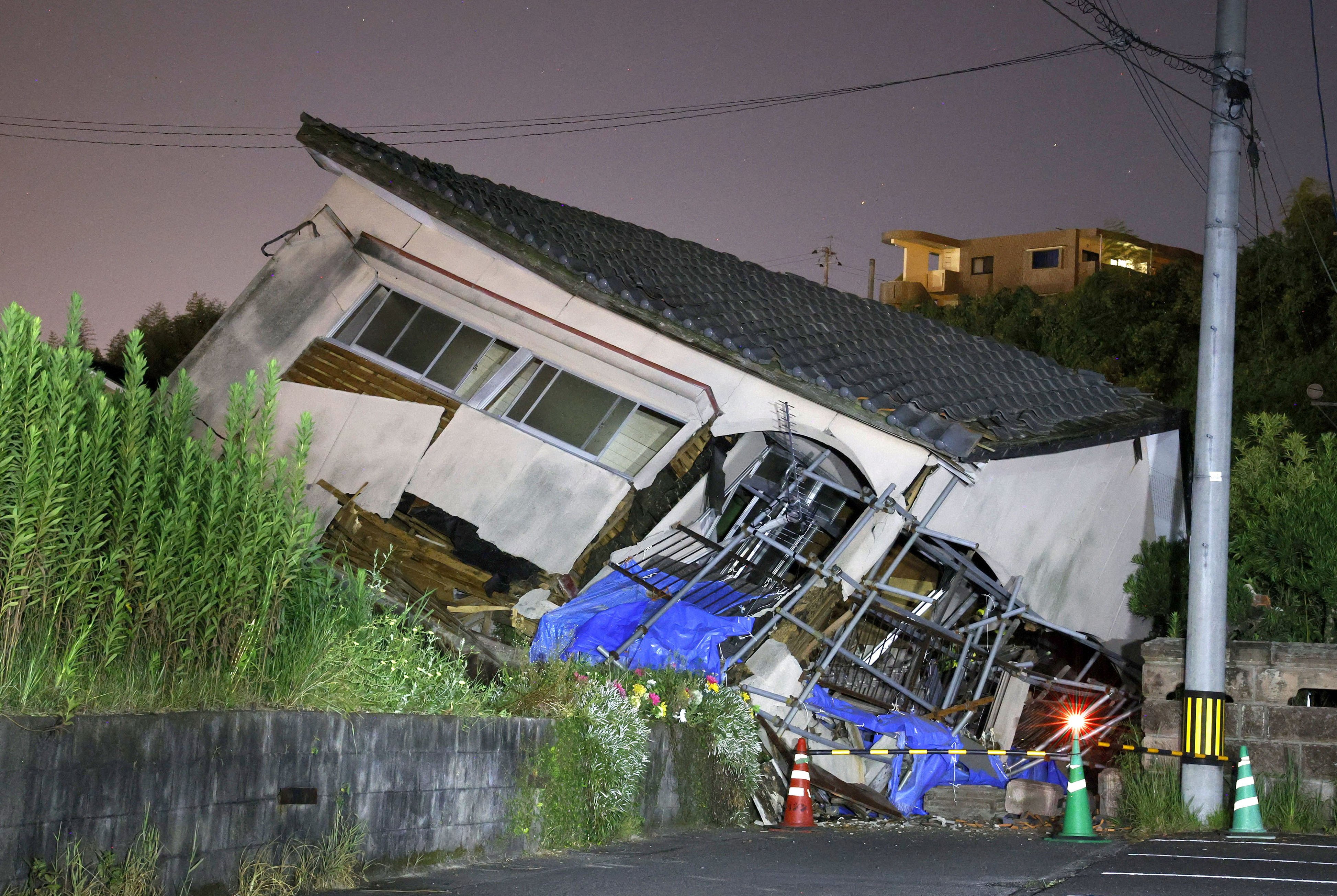 A collapsed house in earthquake-hit Osaki town, Japan’s Kagoshima prefecture. Photo: Kyodo via Reuters