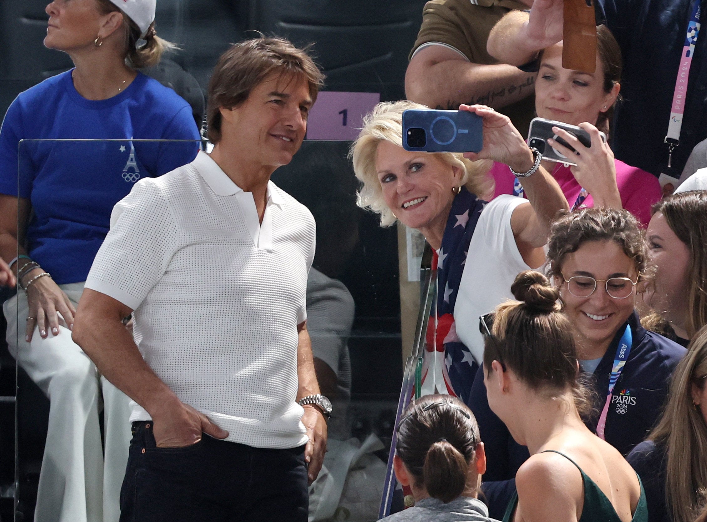 Actor Tom Cruise, seen here with fans at the gymnastics, is reportedly performing a daredevil stunt at the closing ceremony. Photo: Reuters