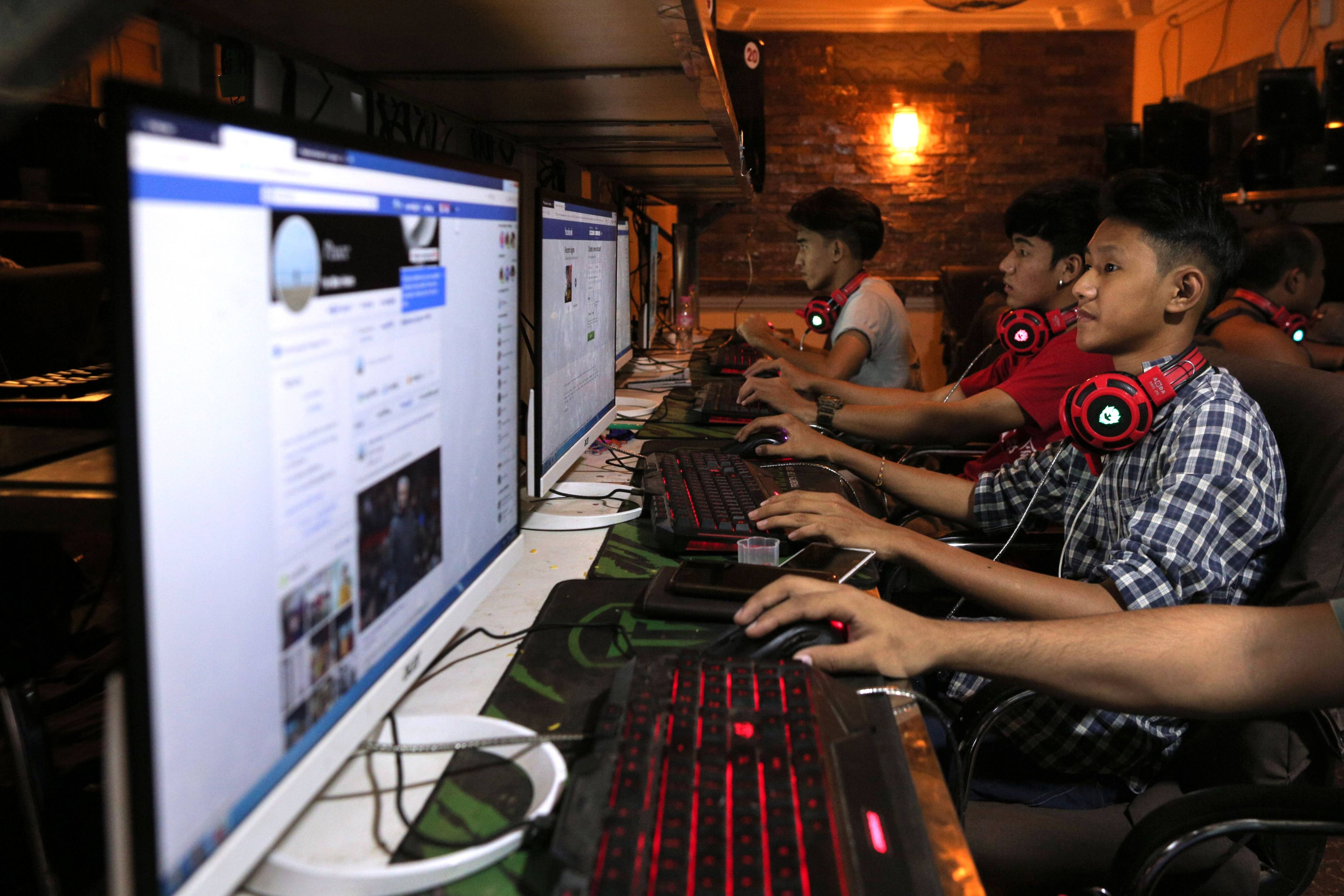 Myanmar youths browsing Facebook at an internet shop in Yangon. File photo: AFP