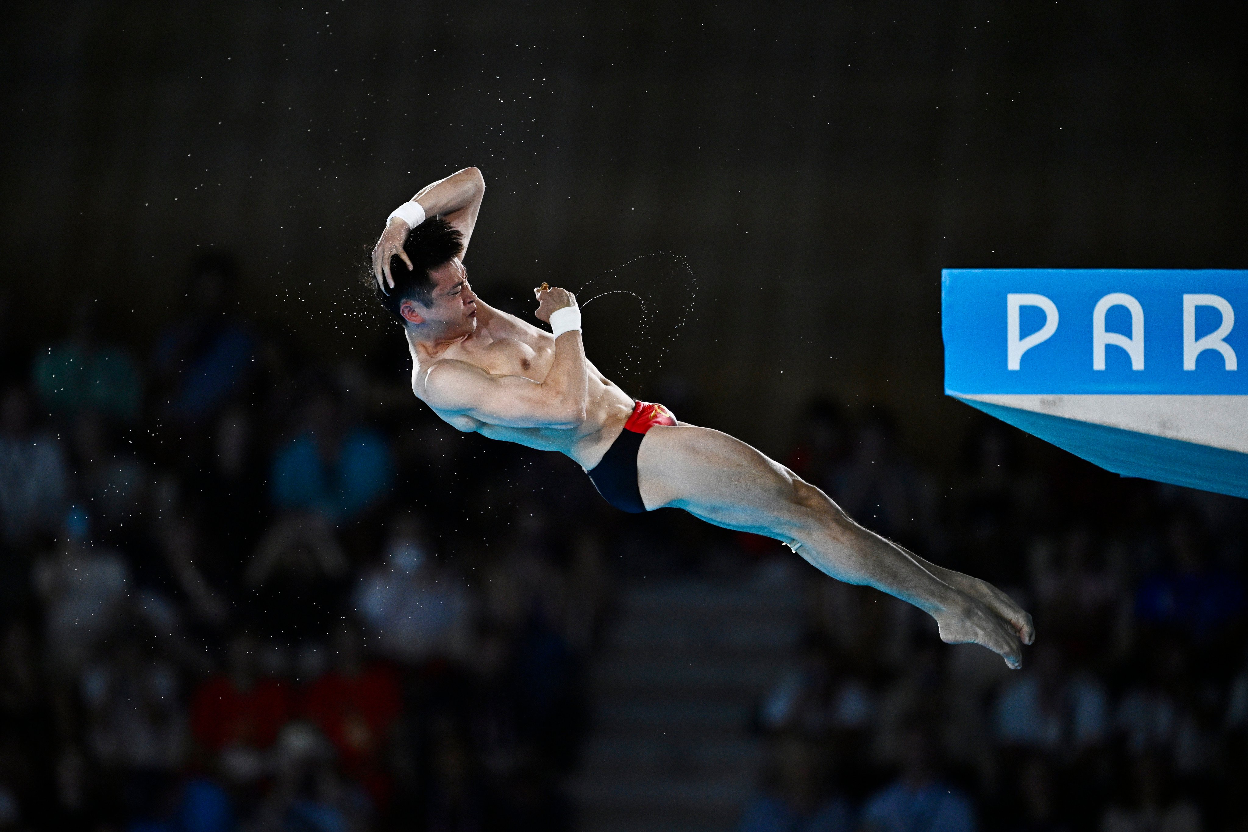 Cao Yuan competes during the men’s 10m platform diving final. Photo: Xinhua