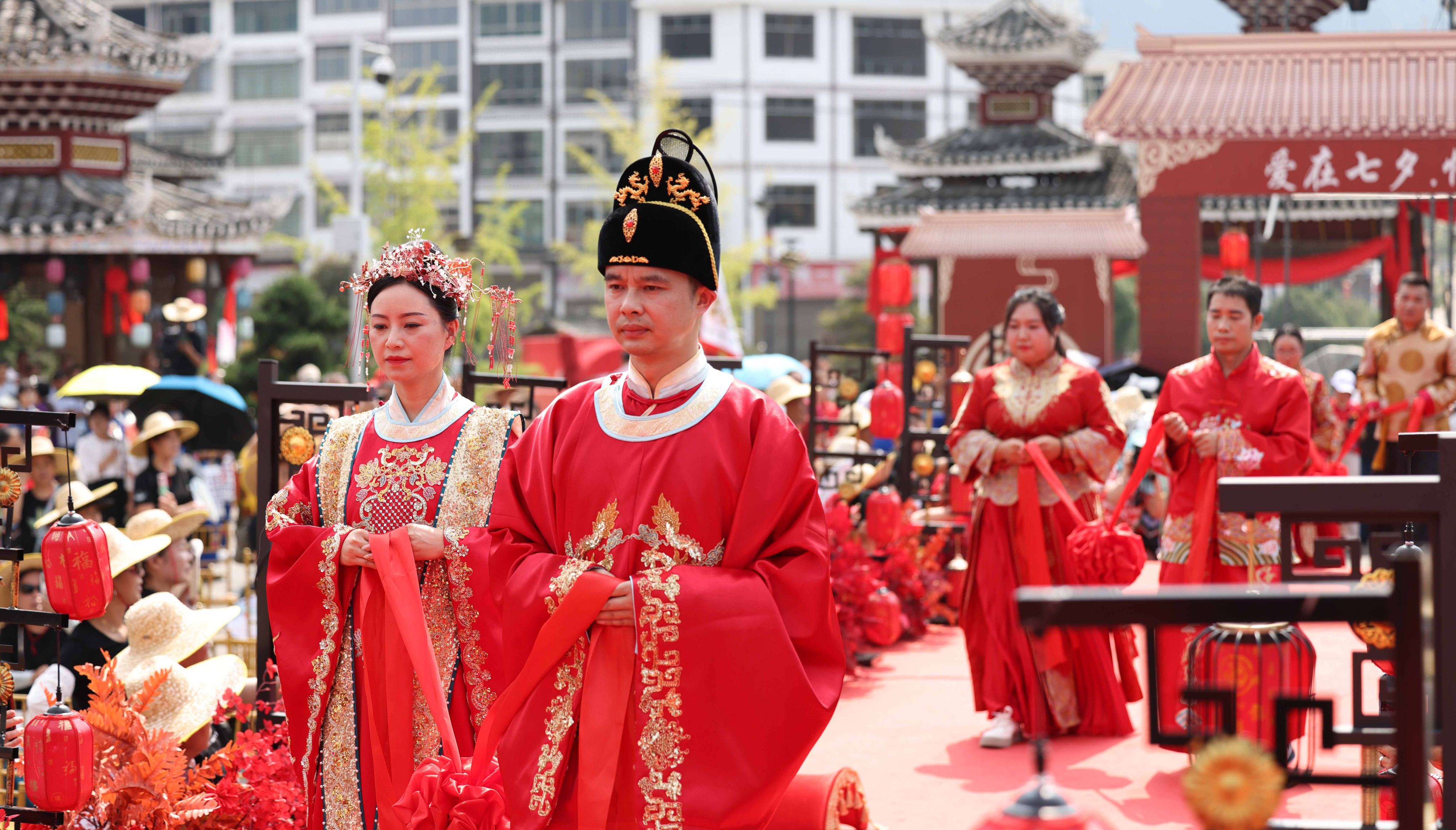 Newly-wed couples attend a group wedding ceremony ahead of the Qixi Festival in China’s Guizhou province in August 2023. Photo: Getty Images