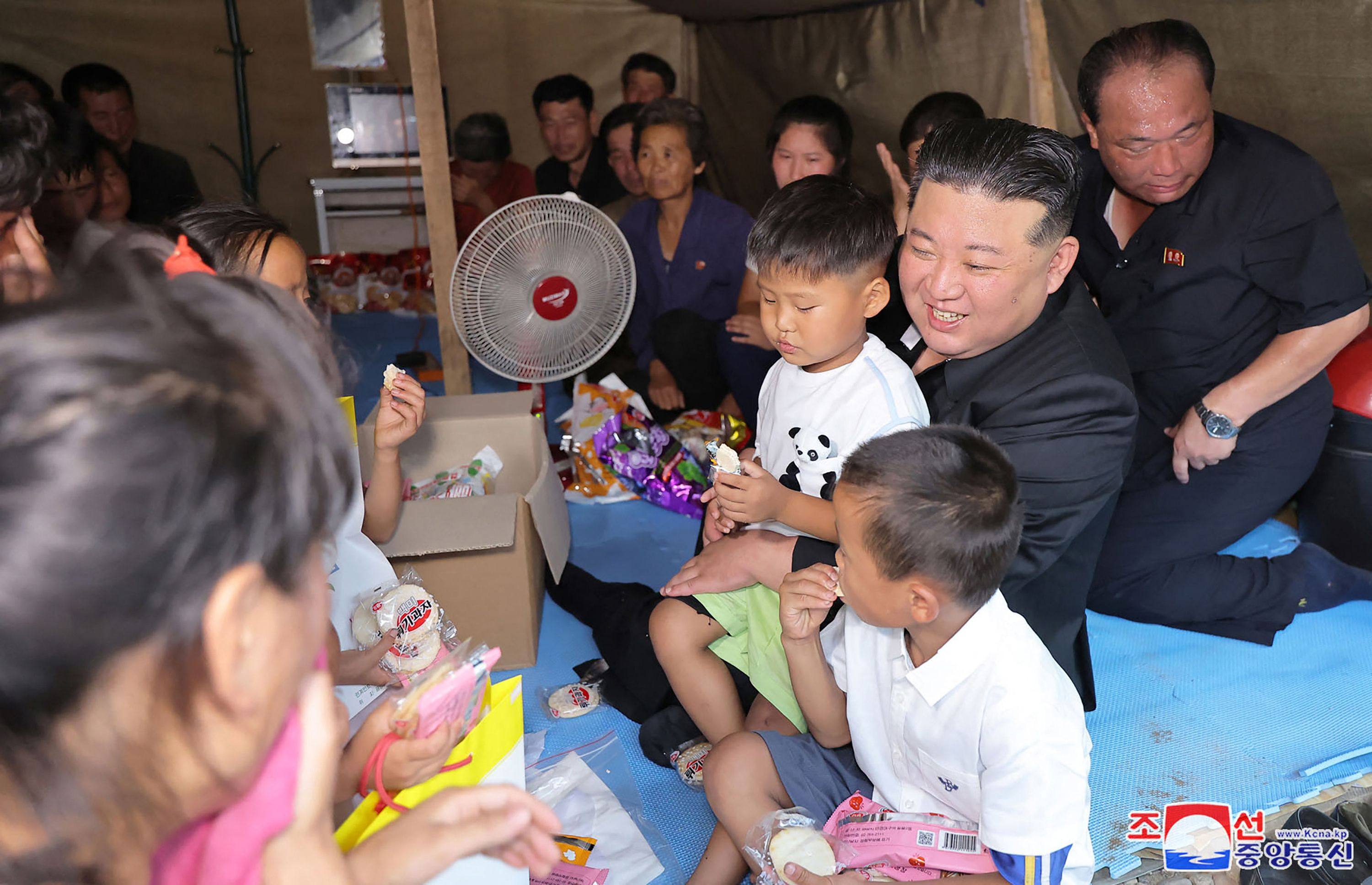 North Korean leader Kim Jong-un visiting the flood-hit area in Uiju County of North Phyongan Province. Photo: KCNA via KNS/ AFP