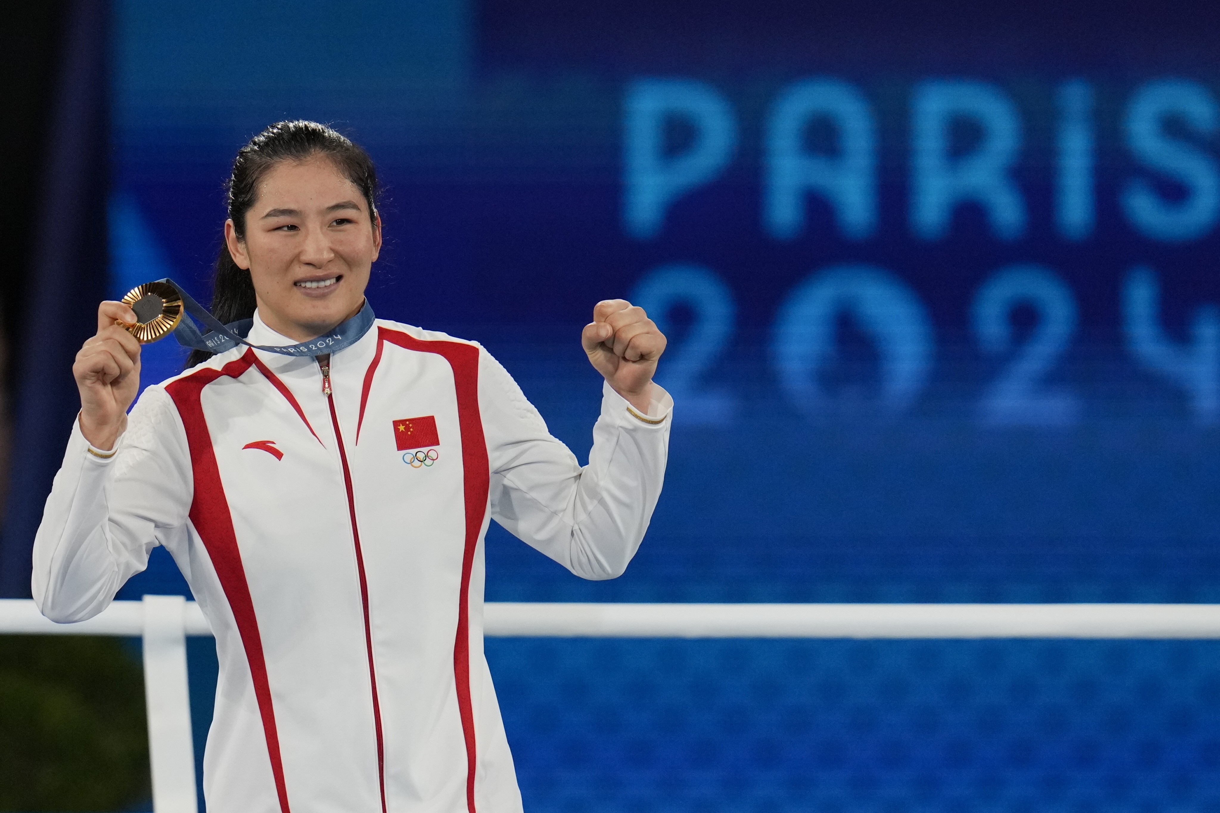 China’s Li Qian poses with her gold medal, the country’s 39th of the Paris Olympics, after winning the women’s 75kg boxing final. Photo: AP