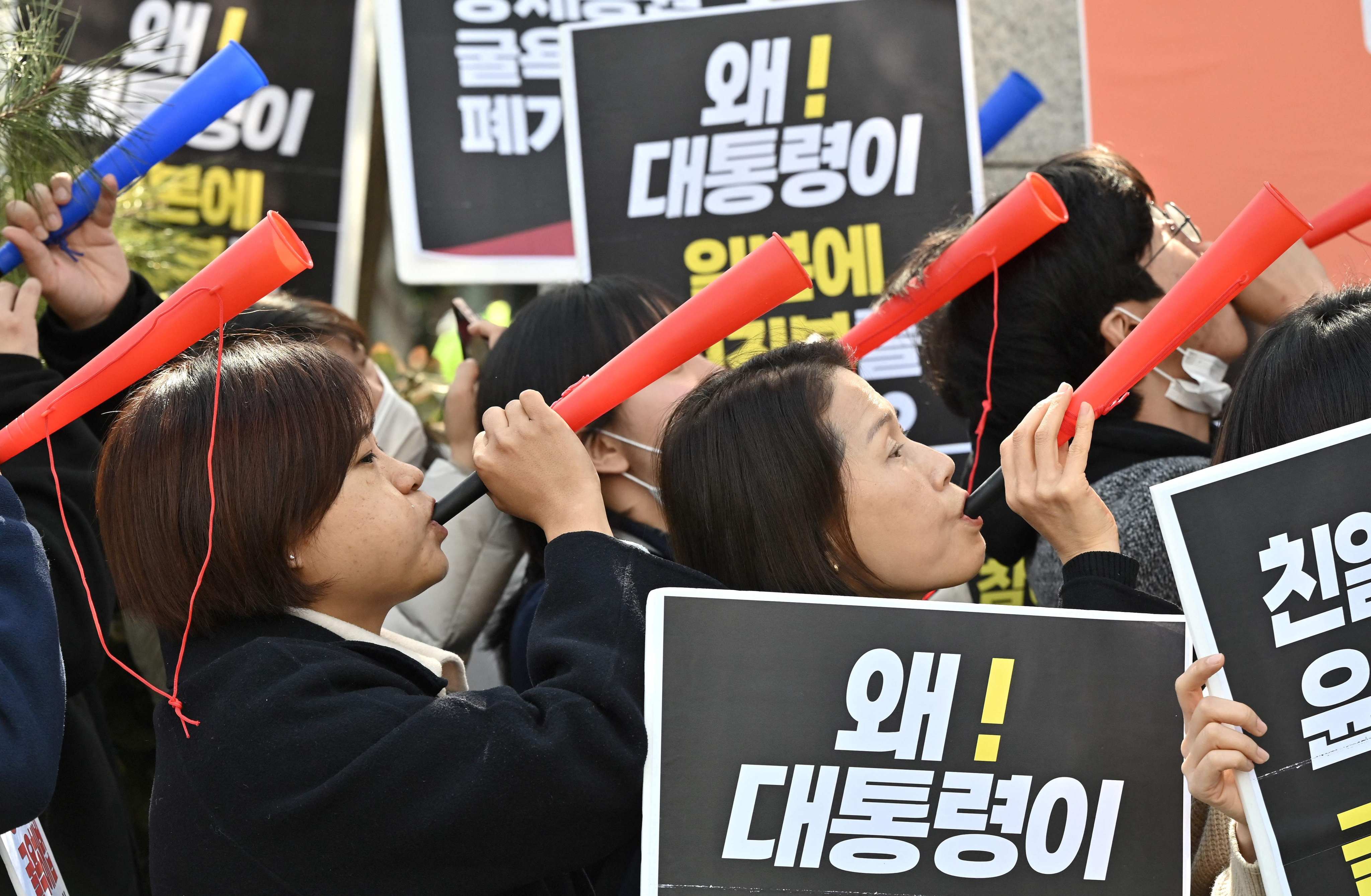 South Korean protesters hold a rally against Seoul’s announcement of plans to compensate victims of Japan’s forced wartime labour, outside the foreign ministry in March 2023. Photo: AFP