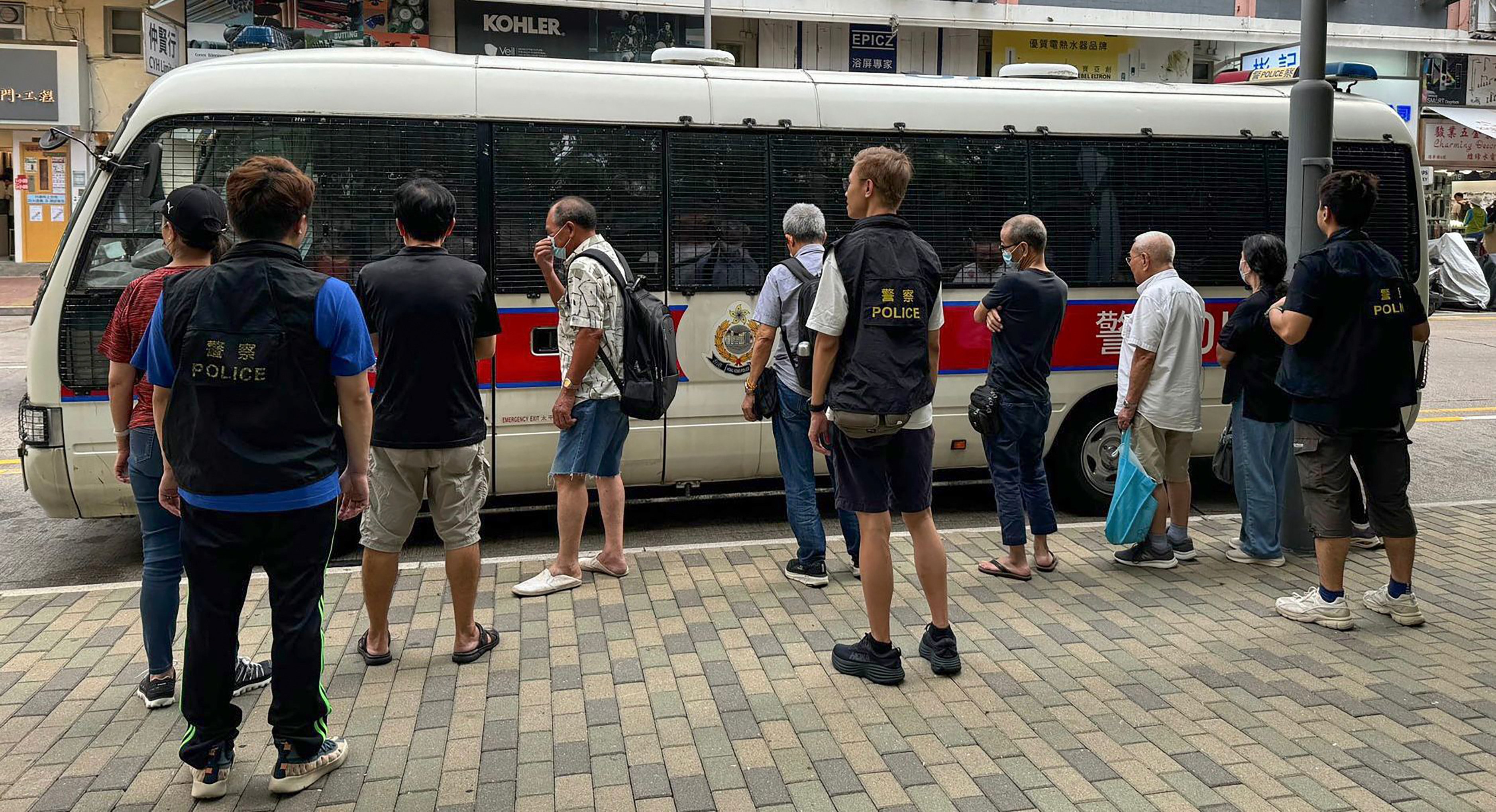 Police arrests a group of people, one aged 90, after an anti-gambling raid last week. Photo: Hong Kong Police