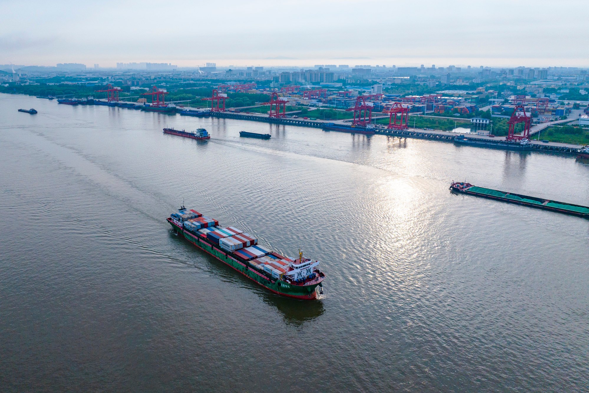 A cargo ship loaded with containers departs from Wuhu in China’s Anhui province in May. Photo: Xinhua.