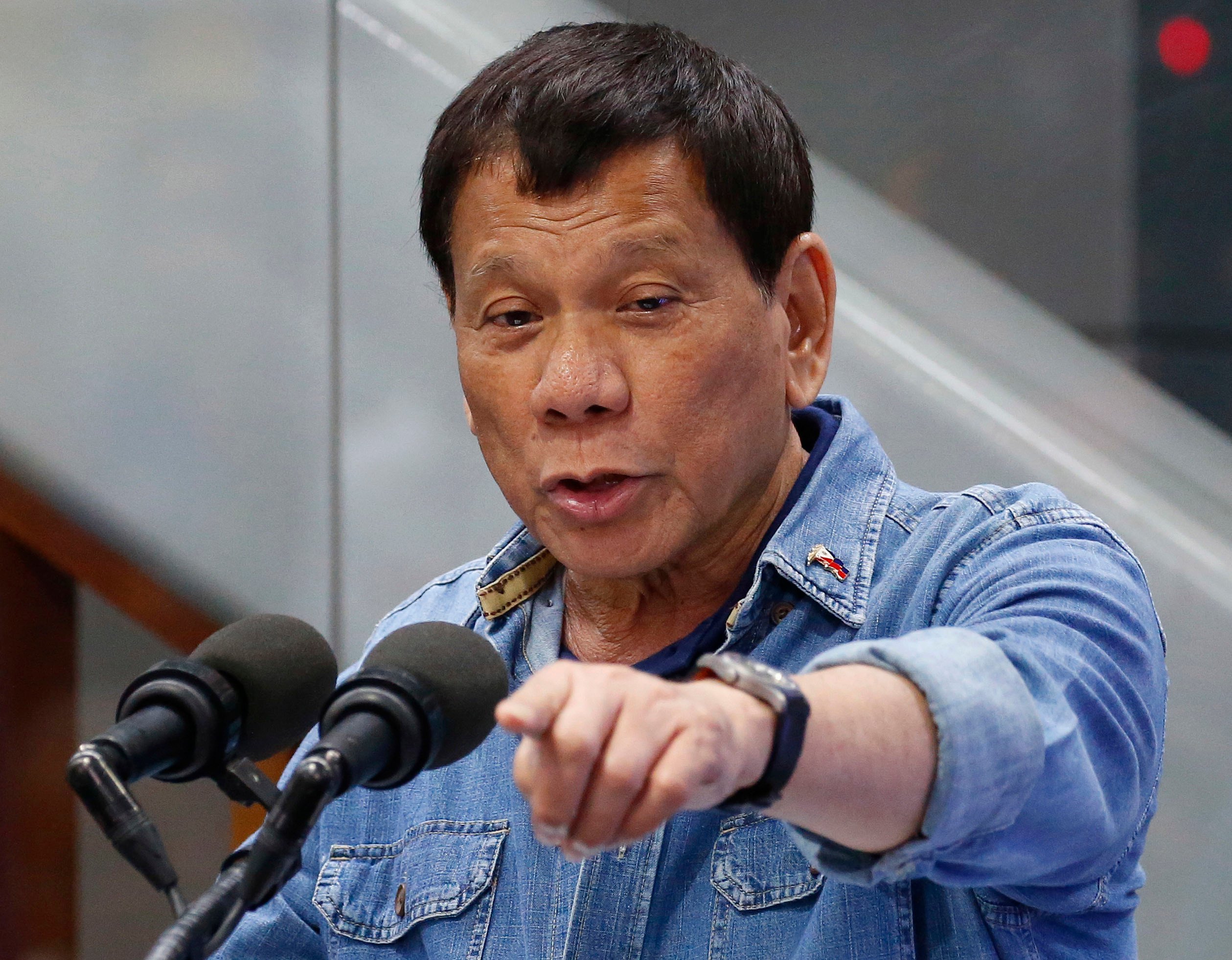 Then-Philippine president Rodrigo Duterte addresses Filipino overseas workers in 2018 at the Ninoy Aquino International Airport in Manila. Photo: AP