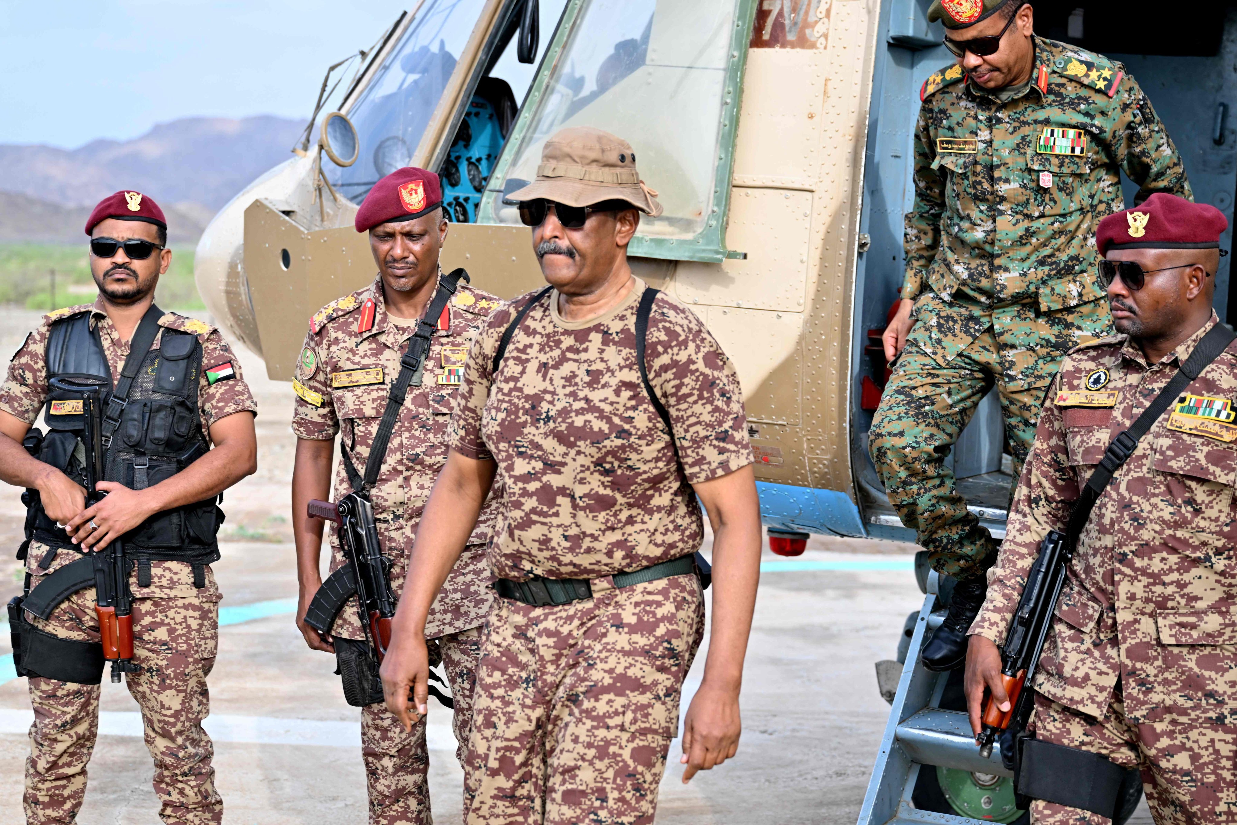 Sudan’s army chief Abdel Fattah al-Burhan, centre, in Gibet, near Port Sudan on July 31. Photo: AFP